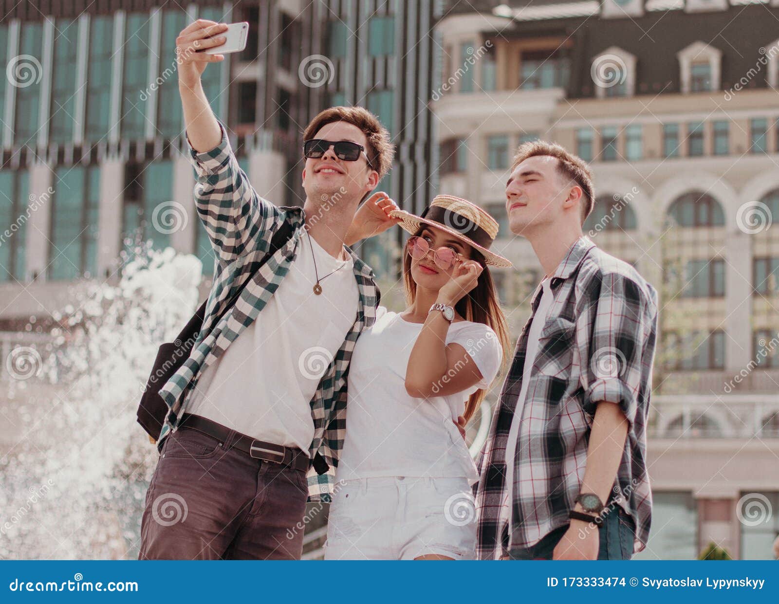 Stylish indian young man at sunglasses wear casual posed outdoor and making  selfie at mobile phone. 10489258 Stock Photo at Vecteezy