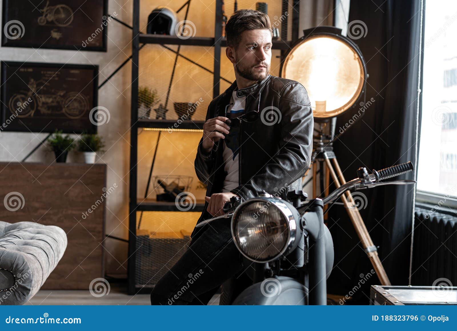 Stylish Young Man in Leather Jacket Sitting on Motorbike. Stock Photo ...