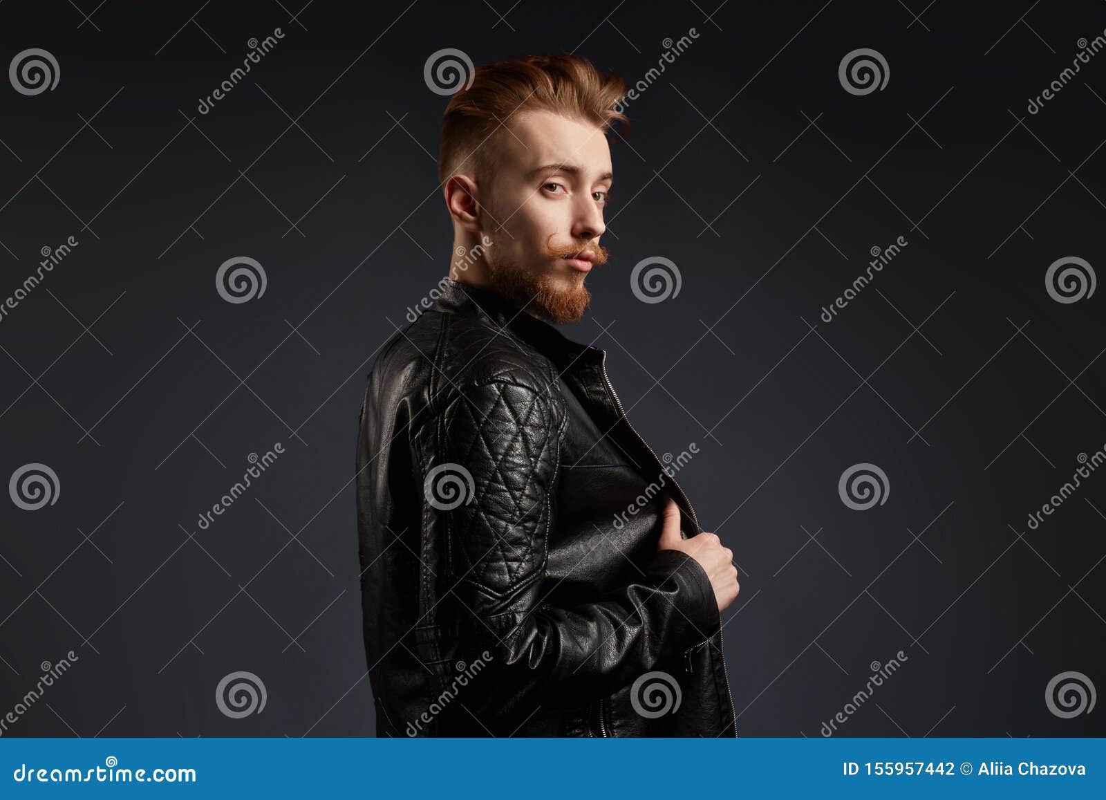 Stylish Young Man Taking Off His Leather Jacket Stock Photo - Image of ...