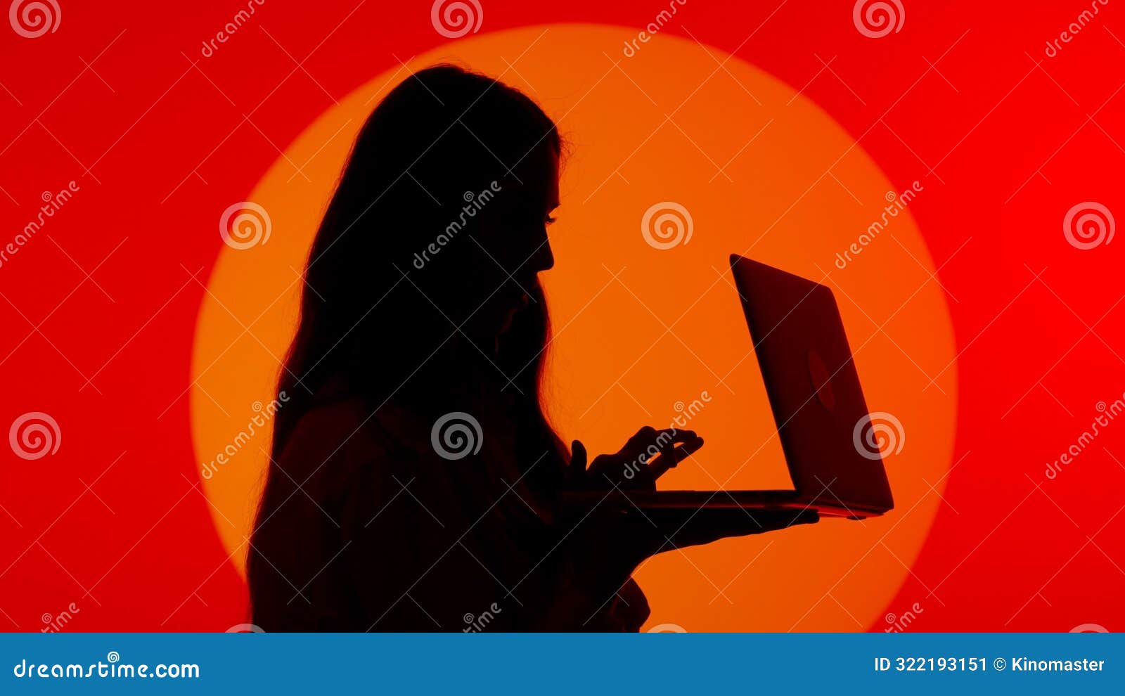 stylish young woman black silhouette in casual using laptop, browsing social media online.  on red studio