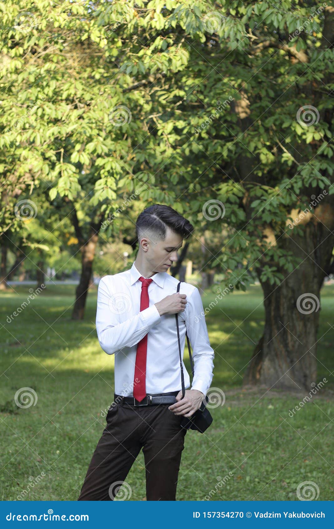 Stylishly Dressed Young Man Posing In A Park Retro Style Photo Shoot Stock Photo Image Of Clothes Handsome 157354270 dreamstime com