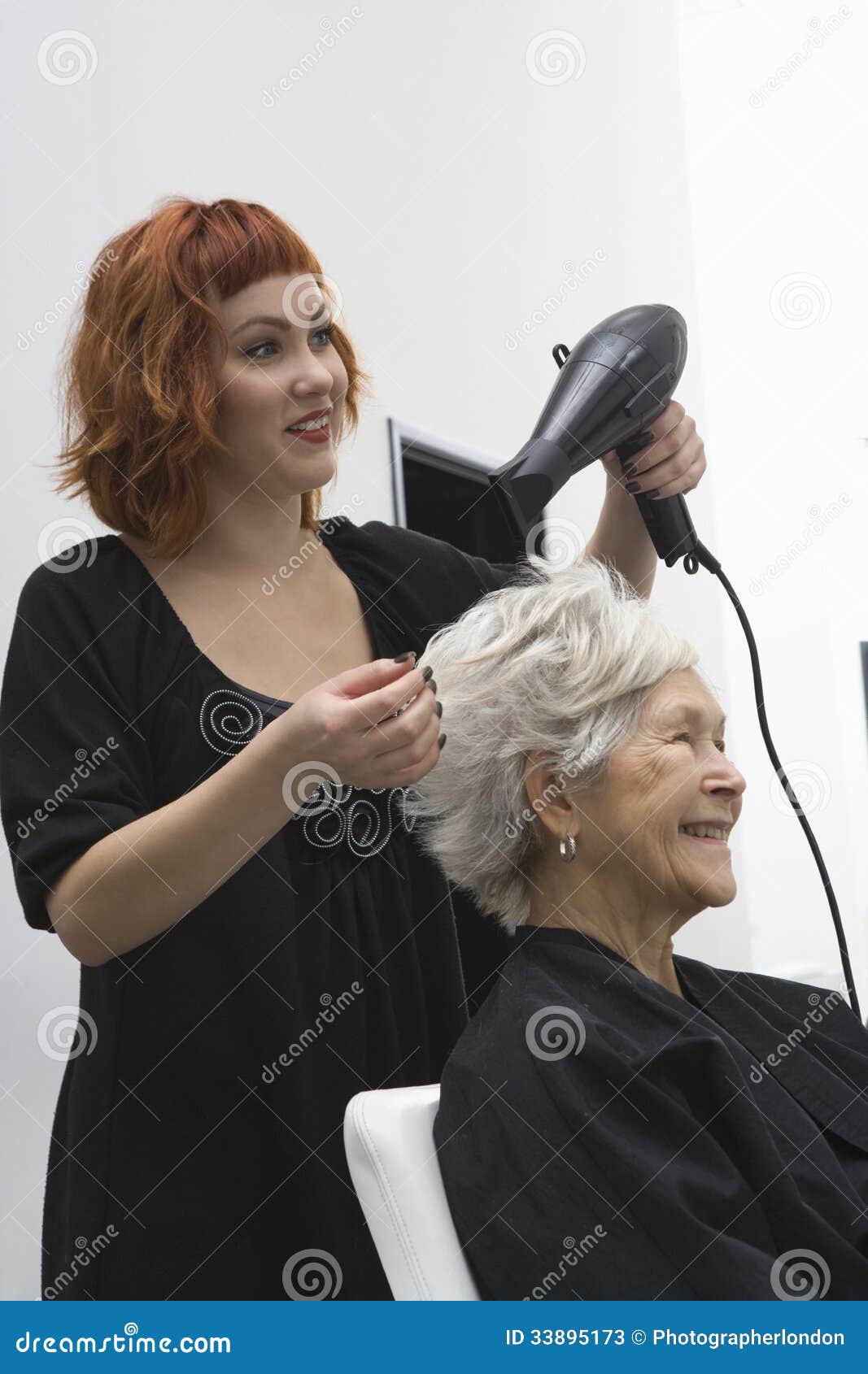 Stylist Blow Drying Senior Woman S Hair Stock Image - Image of drying,  female: 33895173