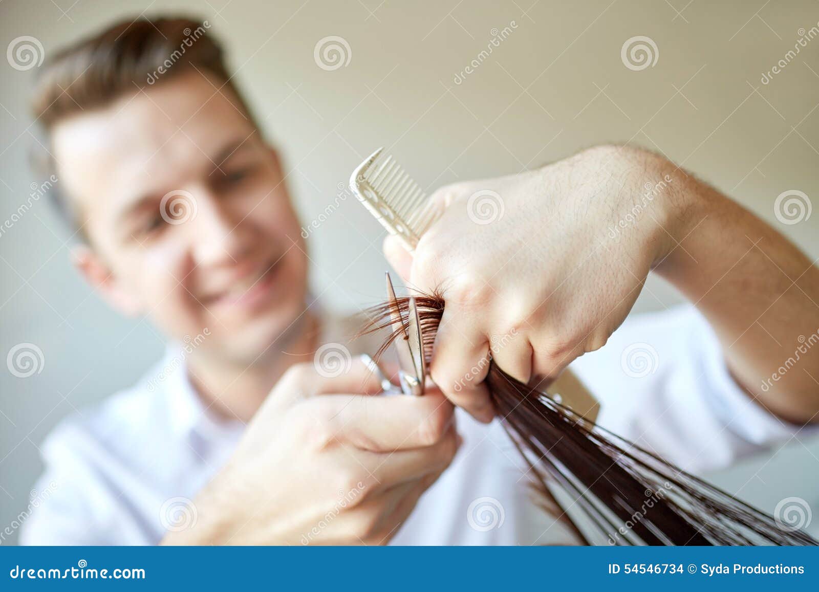 Stylist With Scissors Cutting Hair Tips At Salon Stock 