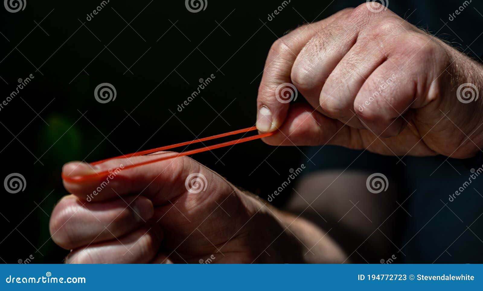 Stretched Rubber Band