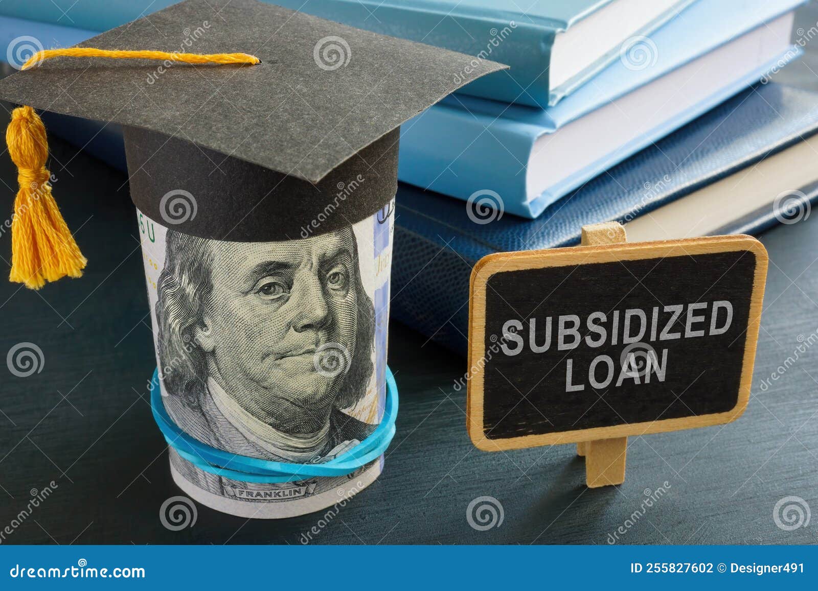 Subsidized Loan Sign and Student Graduation Cap. Stock Photo Image of