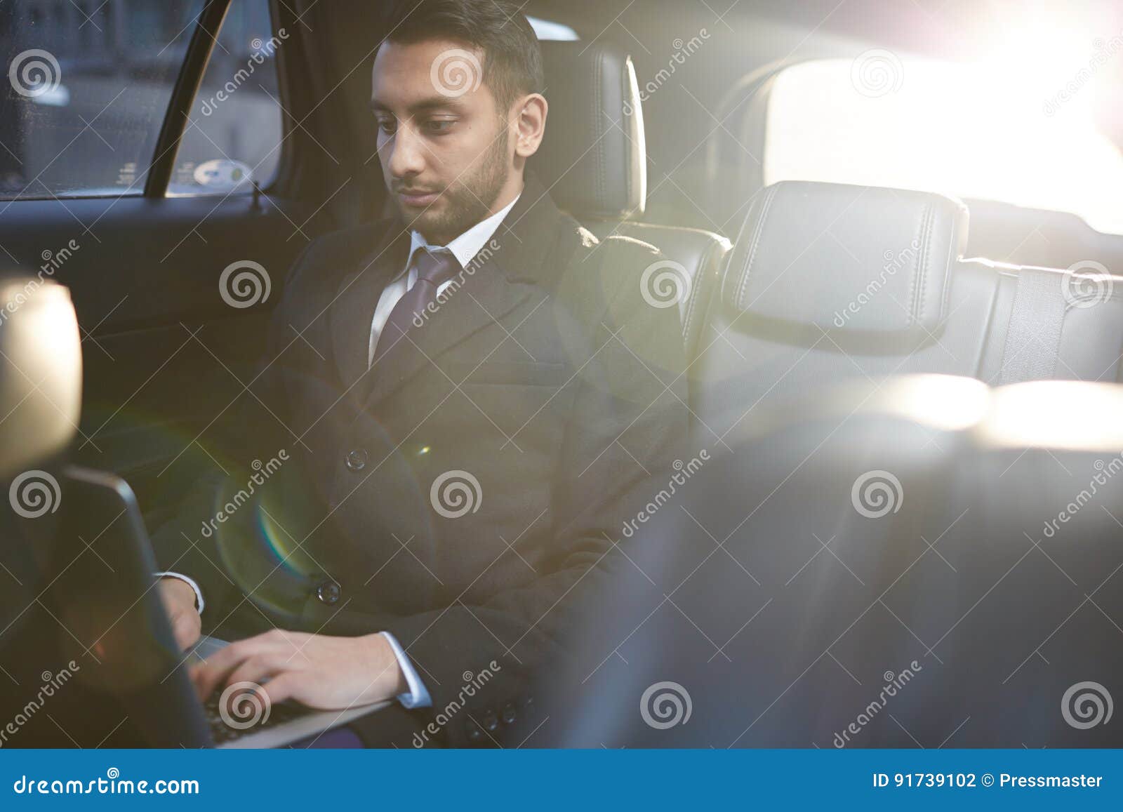 Successful Businessman in Backseat of Car Stock Photo - Image of riding