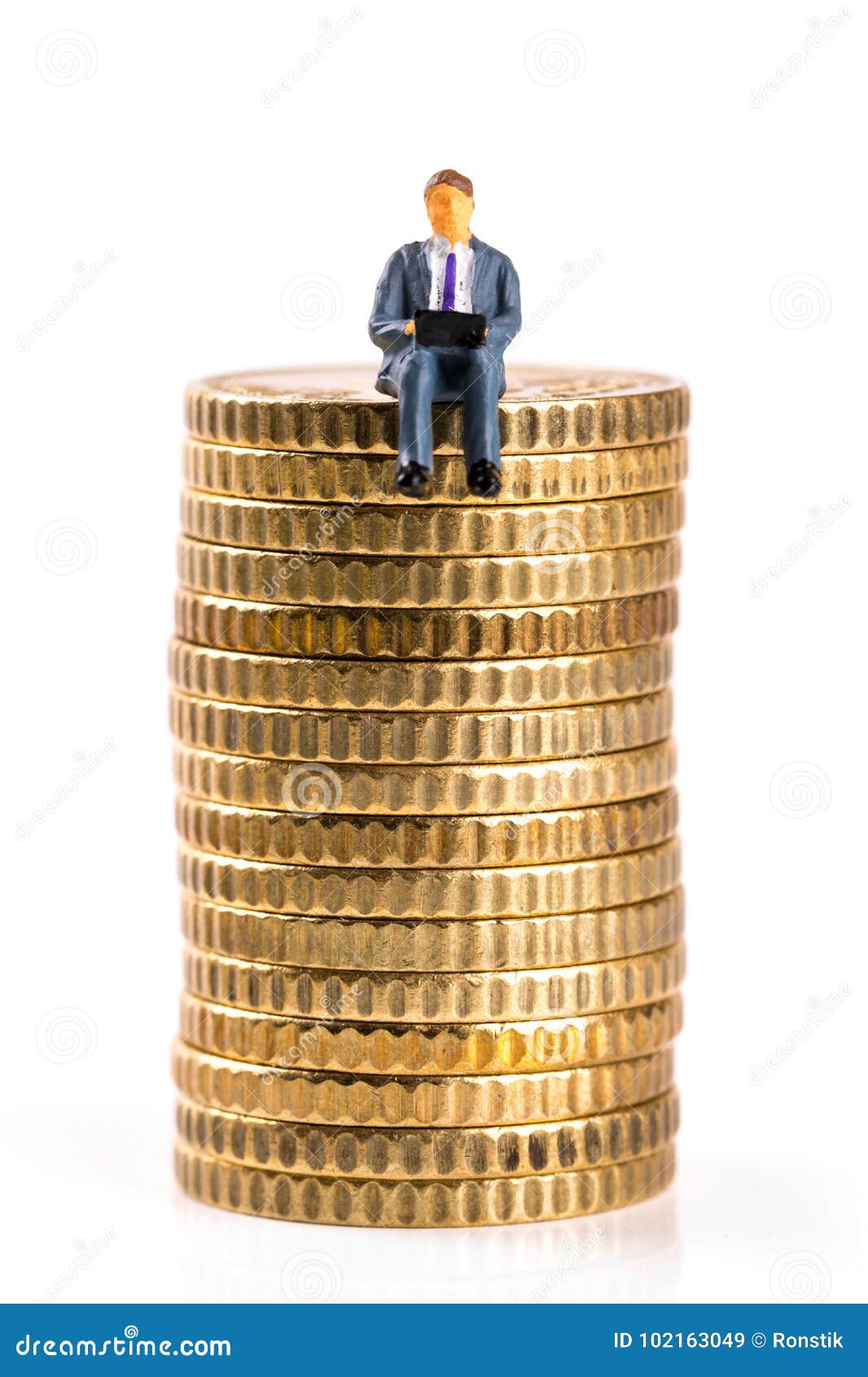 Businessman Covering Stacked Coins On Golden Weighing Scale At Wooden Table  Stock Photo, Picture and Royalty Free Image. Image 84268953.