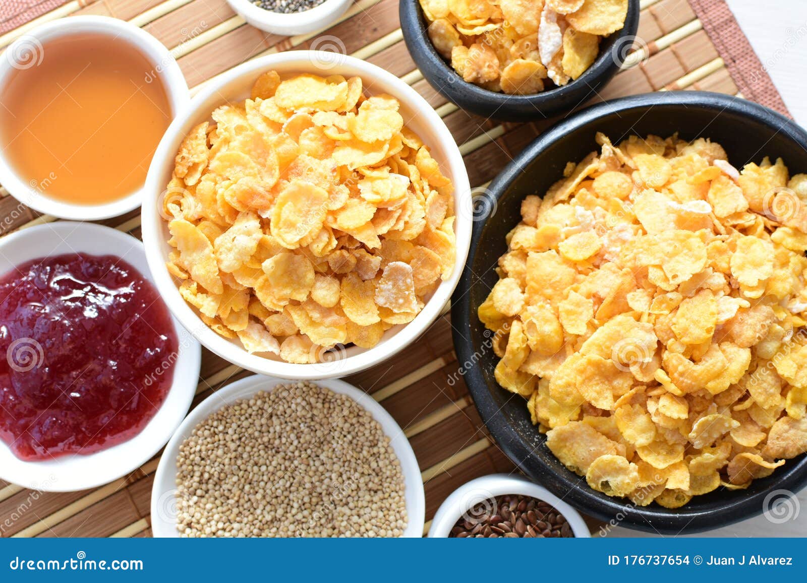 Sugarfree Cereal Flakes Displayed in Containers by Quinoa
