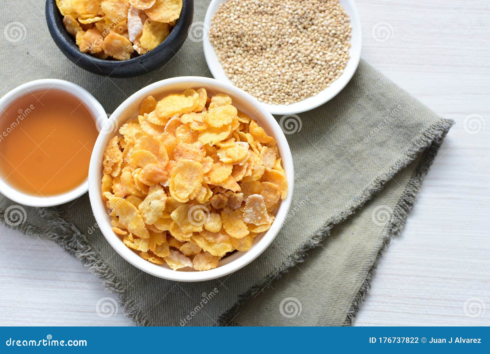 Sugarfree Cereal Flakes Displayed in Containers by Quinoa