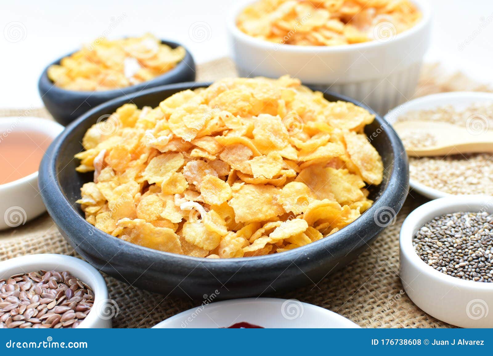 Sugarfree Cereal Flakes Displayed in Containers by Quinoa