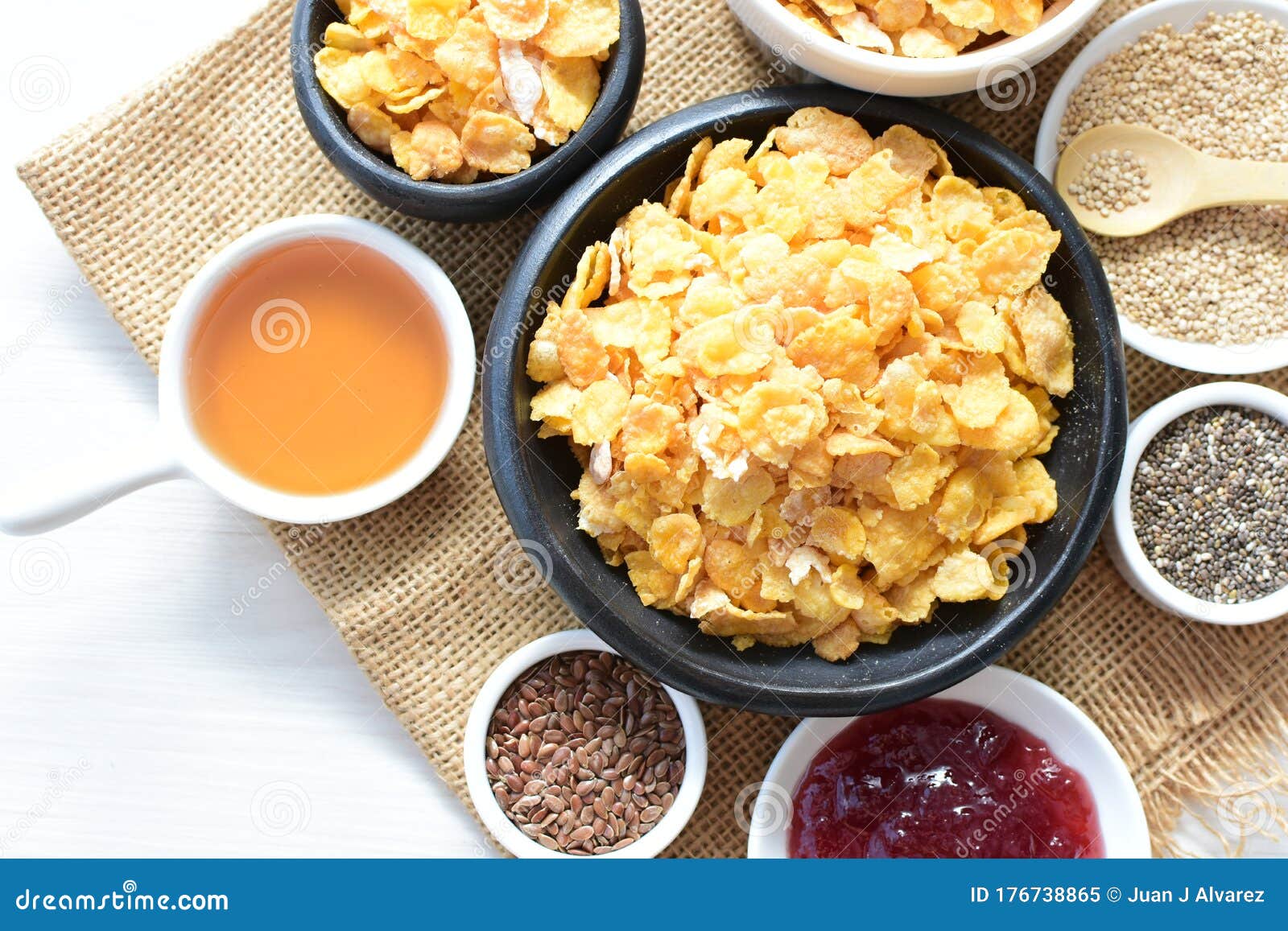 Sugarfree Cereal Flakes Displayed in Containers by Quinoa