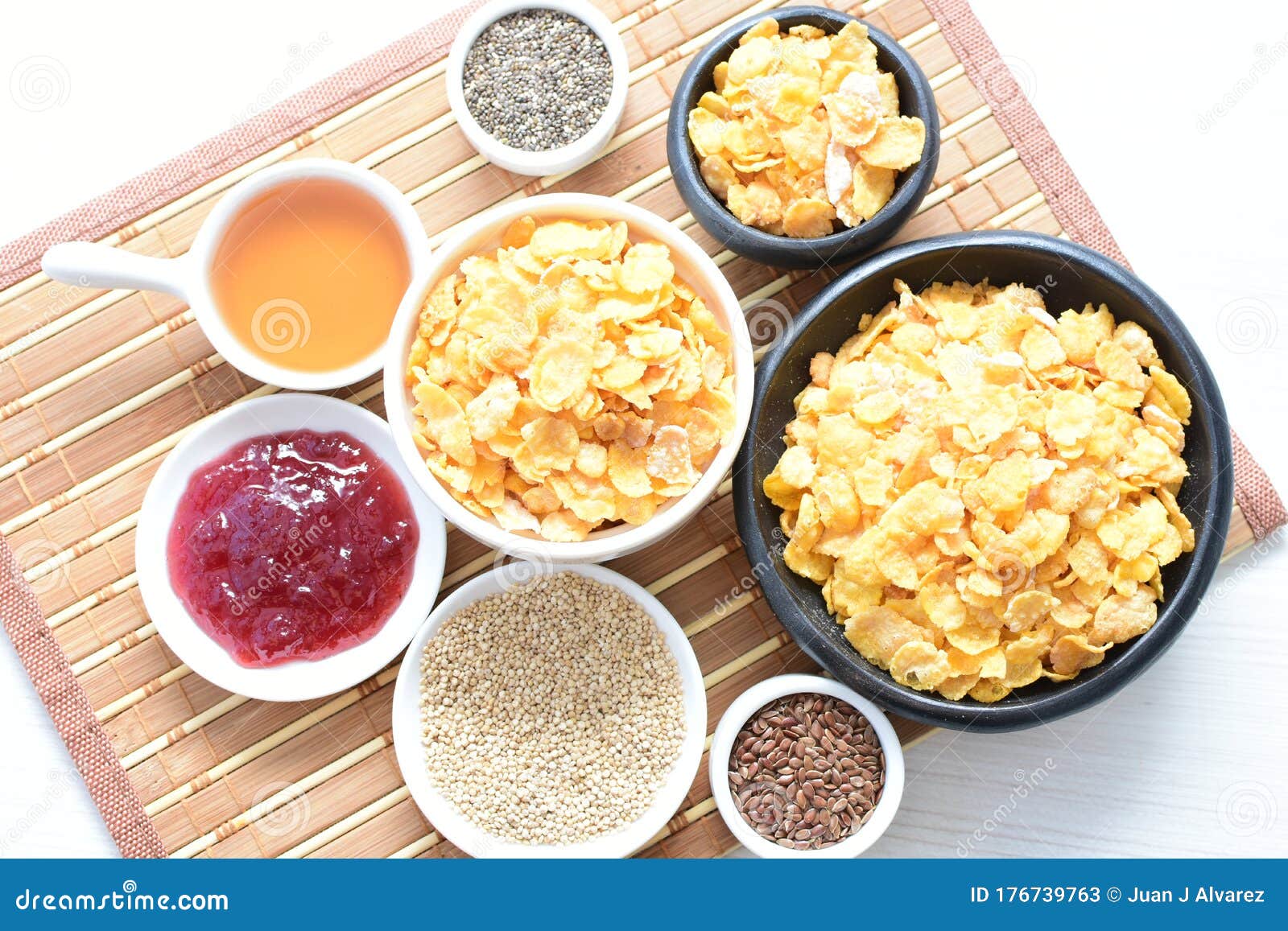 Sugarfree Cereal Flakes Displayed in Containers by Quinoa