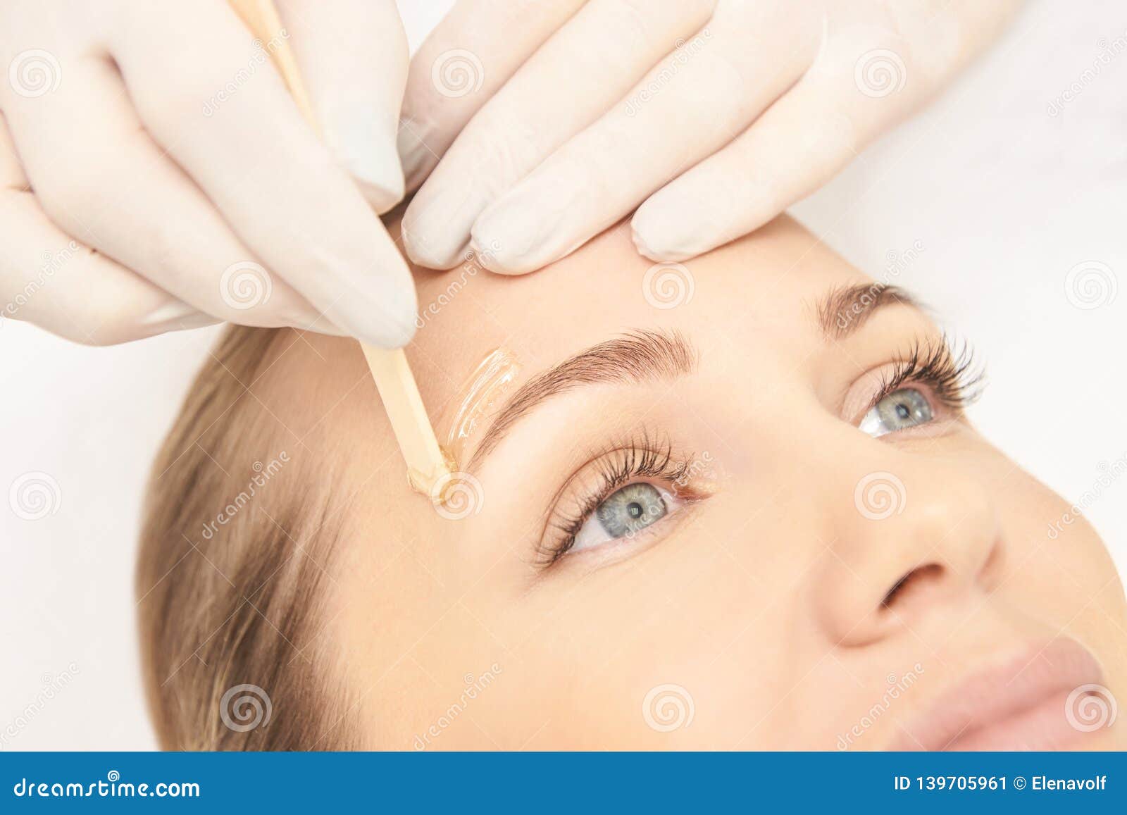 sugar hair removal woman body wax epilation spa procedure procedure beautician female eyebrow sugar hair removal woman 139705961