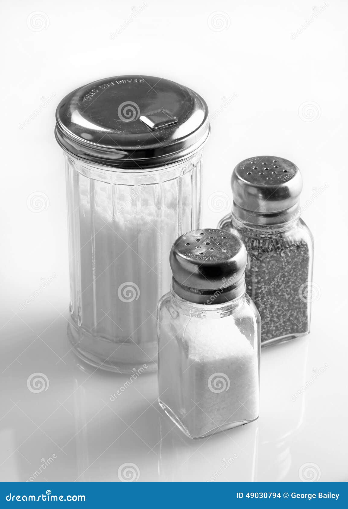Sugar, Salt, and Pepper Shakers. Stock Photo Image of container