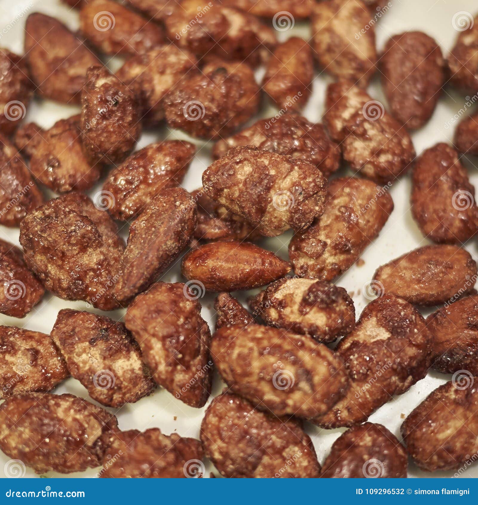 Sugared almonds closeup stock photo. Image of caramel 109296532