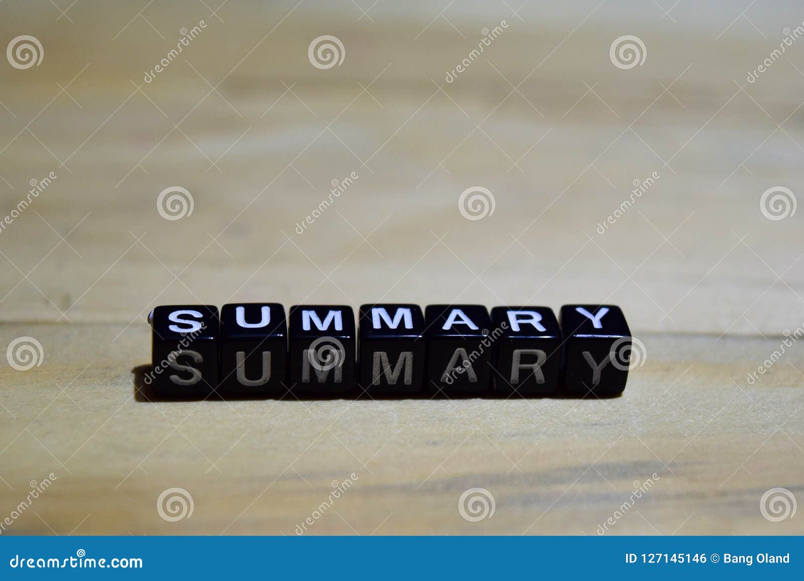 summary message written on wooden blocks.