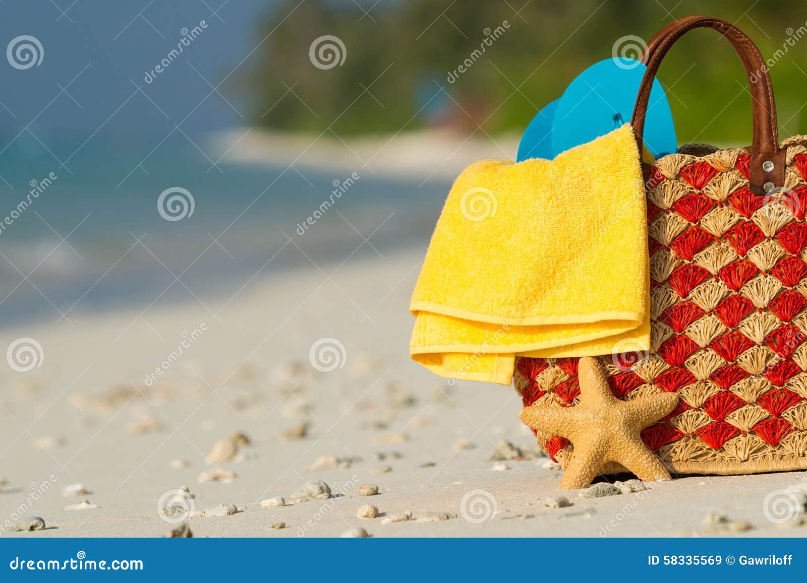 Summer Beach Bag with Shell, Towel on Sandy Beach Stock Image - Image ...