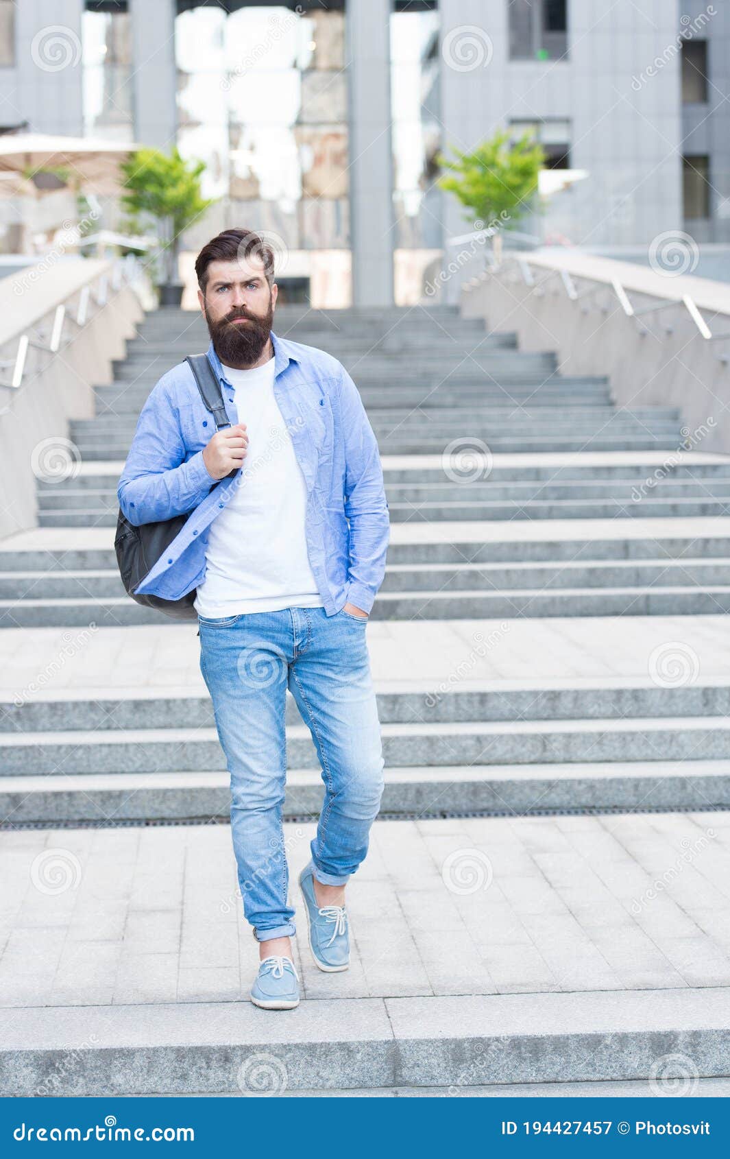 Summer is in. Bearded Man Go Downstairs Outdoors. Hipster Wear