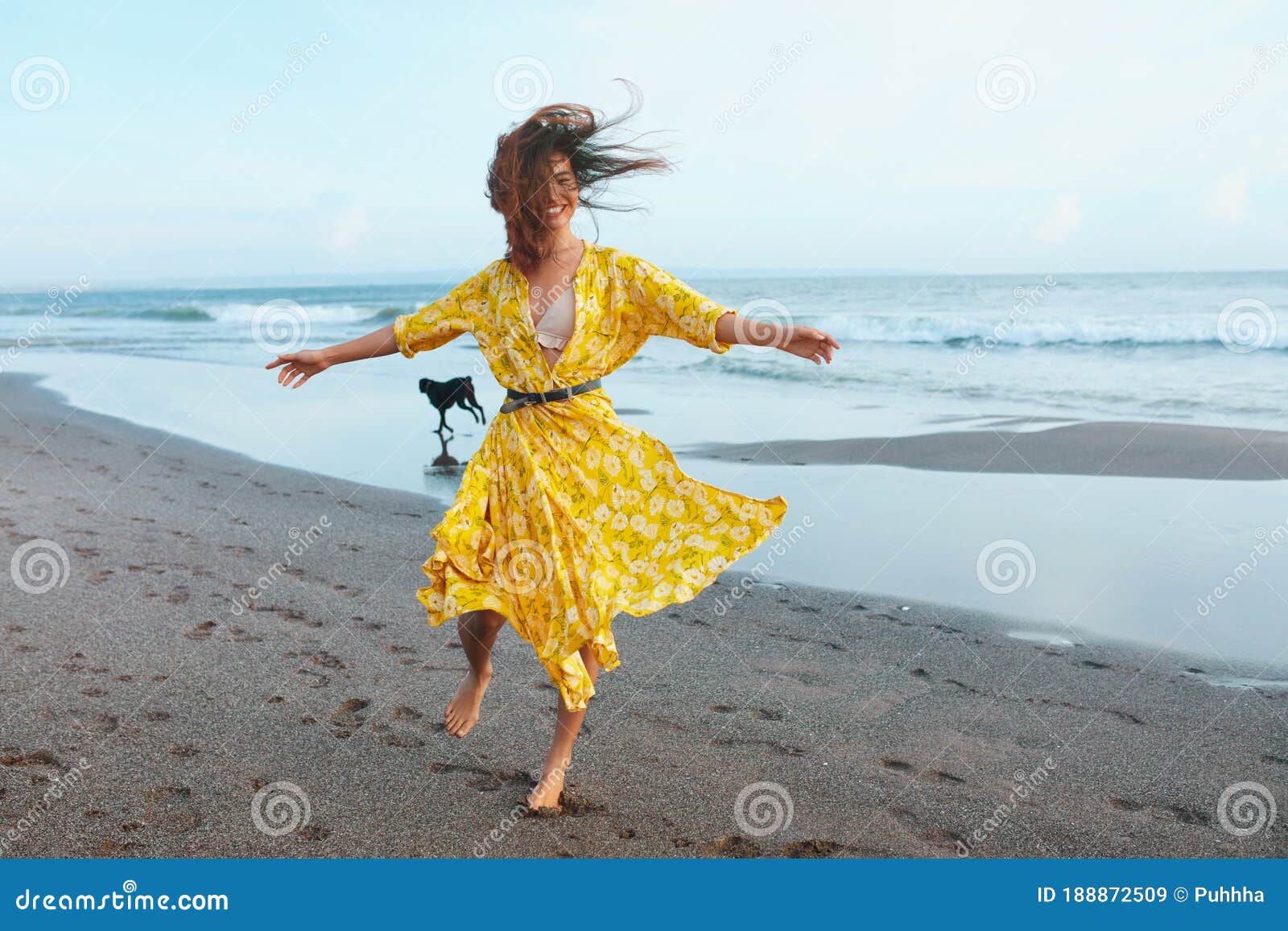 Summer Fashion. Woman in Bohemian Clothing Walking with Dog on Beach ...