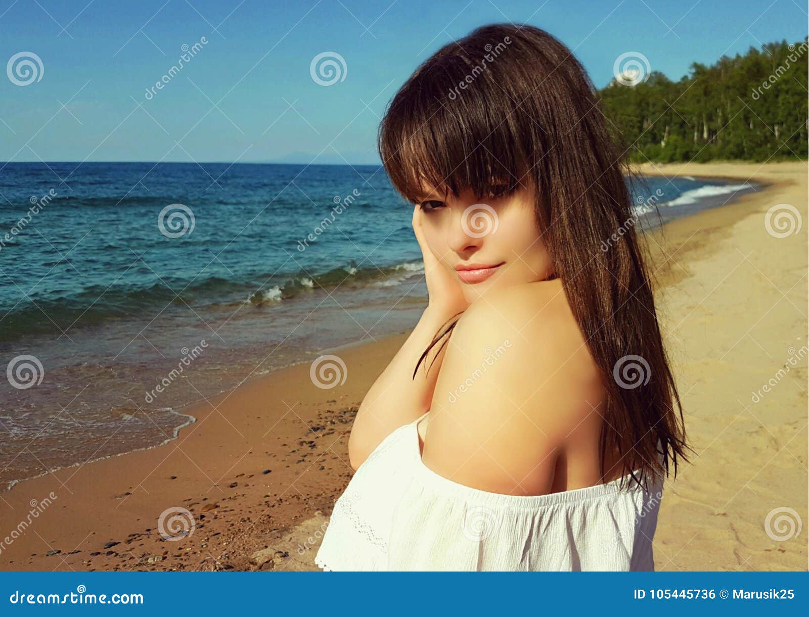 Beautiful Young Woman at Summer Beach. Portrait of Beautiful Woman