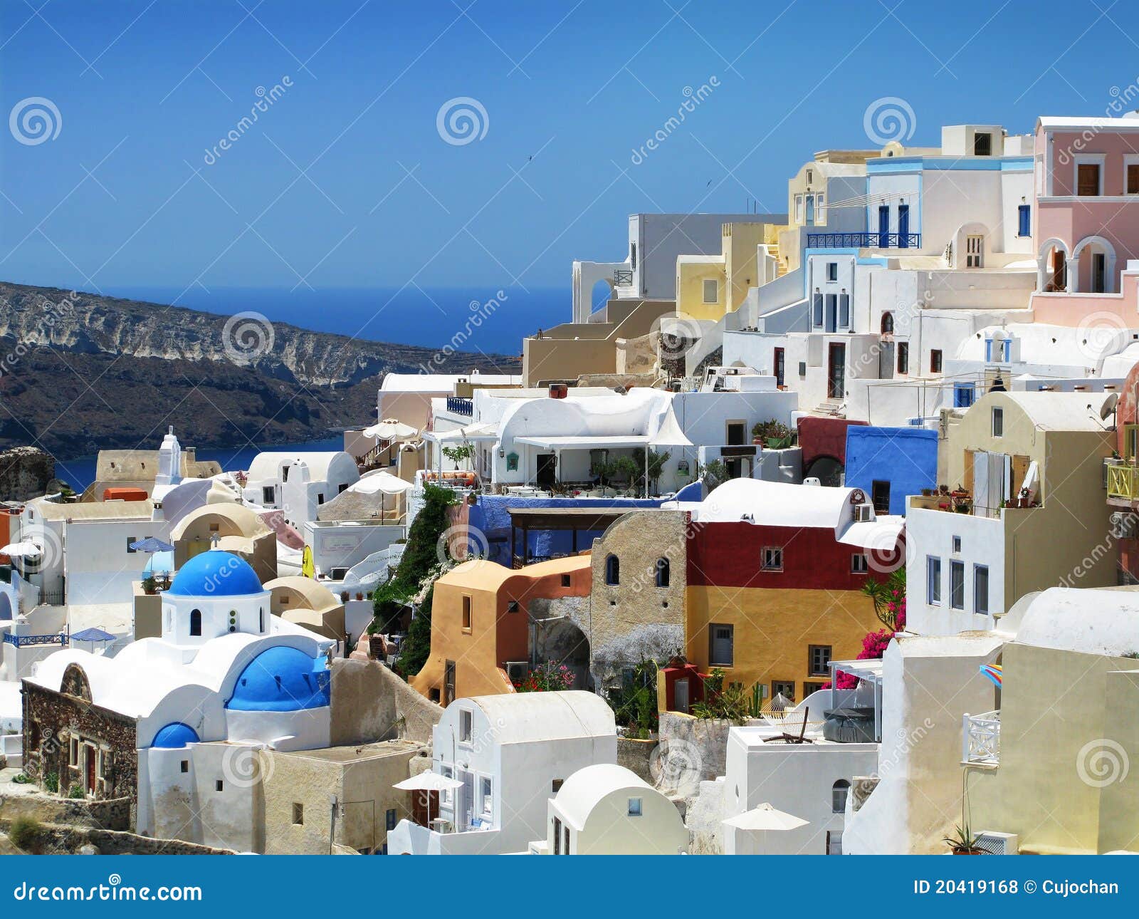 Summer in Santorini. View to Santorini (Greece) with background of sea and mountain