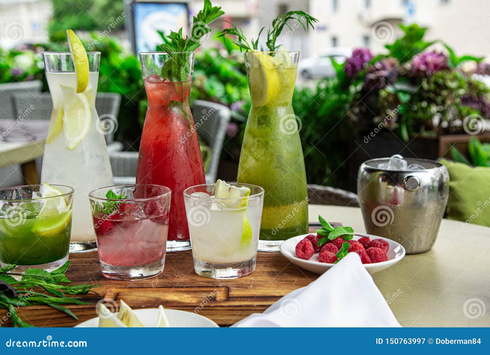 Summer Soft Drinks, a Set of Lemonades. Lemonades in Jugs on the Table