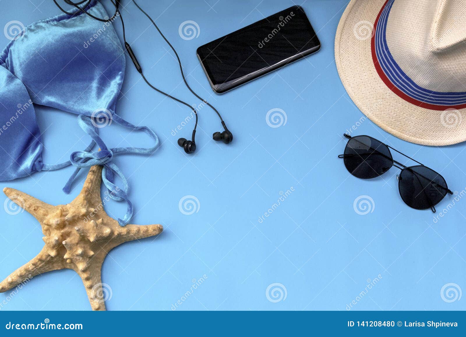 Summer Travel Accessories Flat Lay on Blue Background. Swimsuit Bikini ...