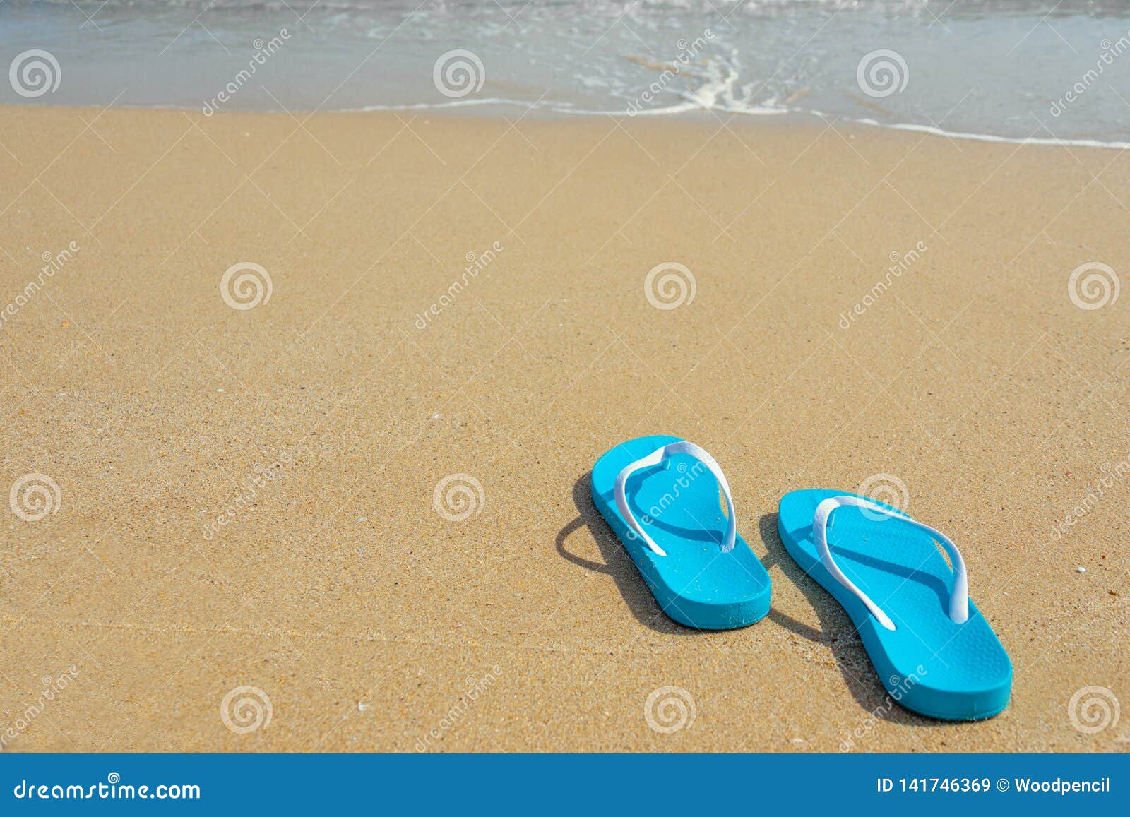 Tropical Summer Vacation Concept. Flipflops on a Sandy Ocean Beach ...