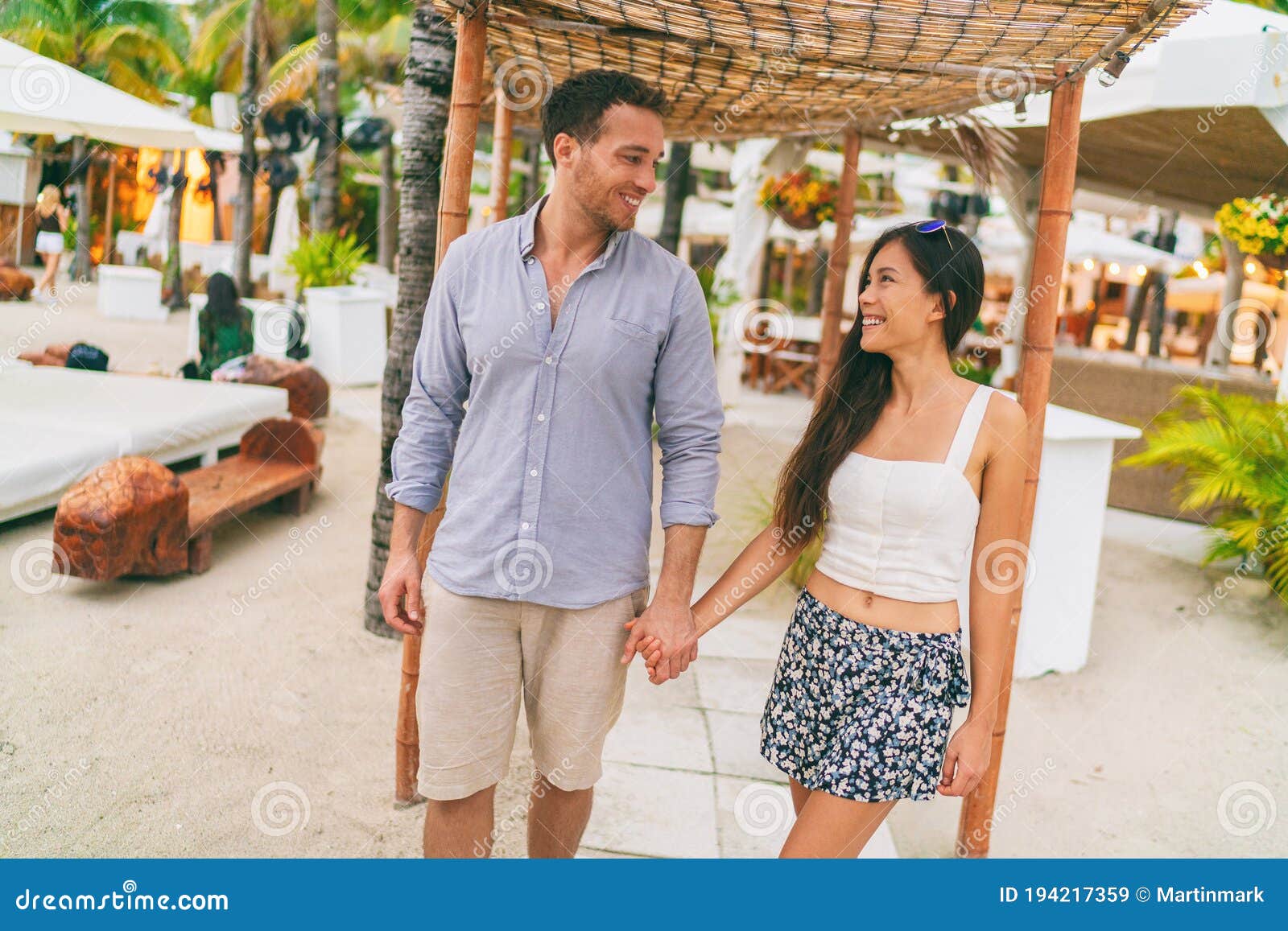 Summer Vacation Happy Couple At Tropical Beach Resort Hotel Walking To