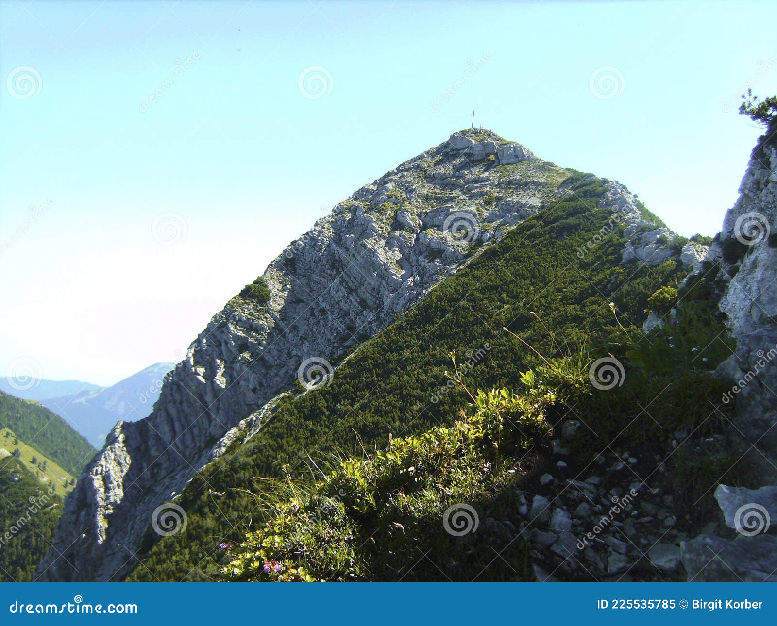 summit cross of mountain aiplspitz in bavaria, germany