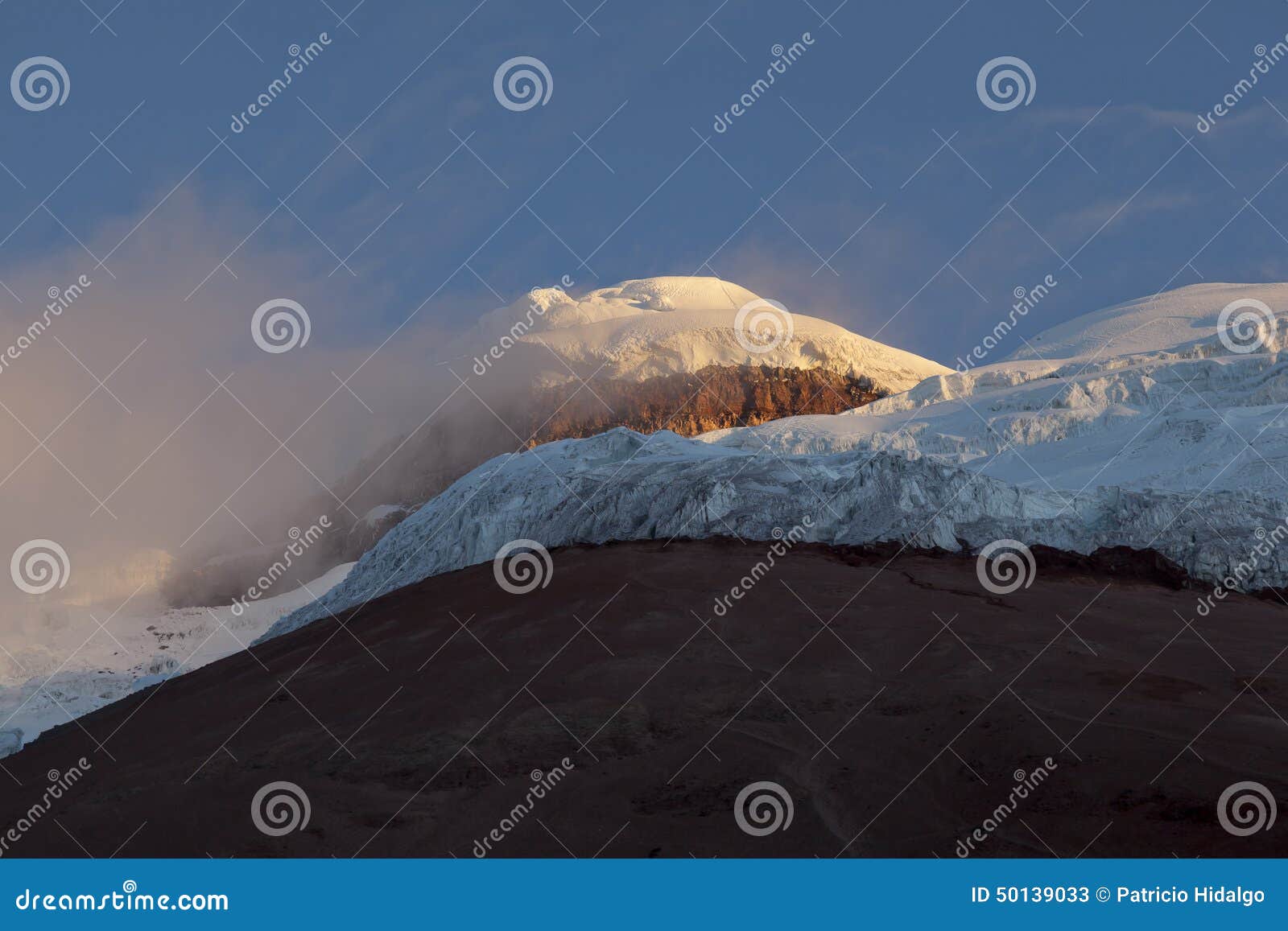 summit and yanasacha rock wall in the cotopaxi at dusk