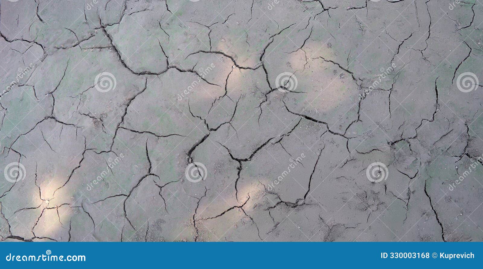 Sun Beams on Dry Cracked Gray Ground Shadow Close up Stock Photo Sun Beams on Dry Cracked Gray Ground Shadow Close up Stock Photo
