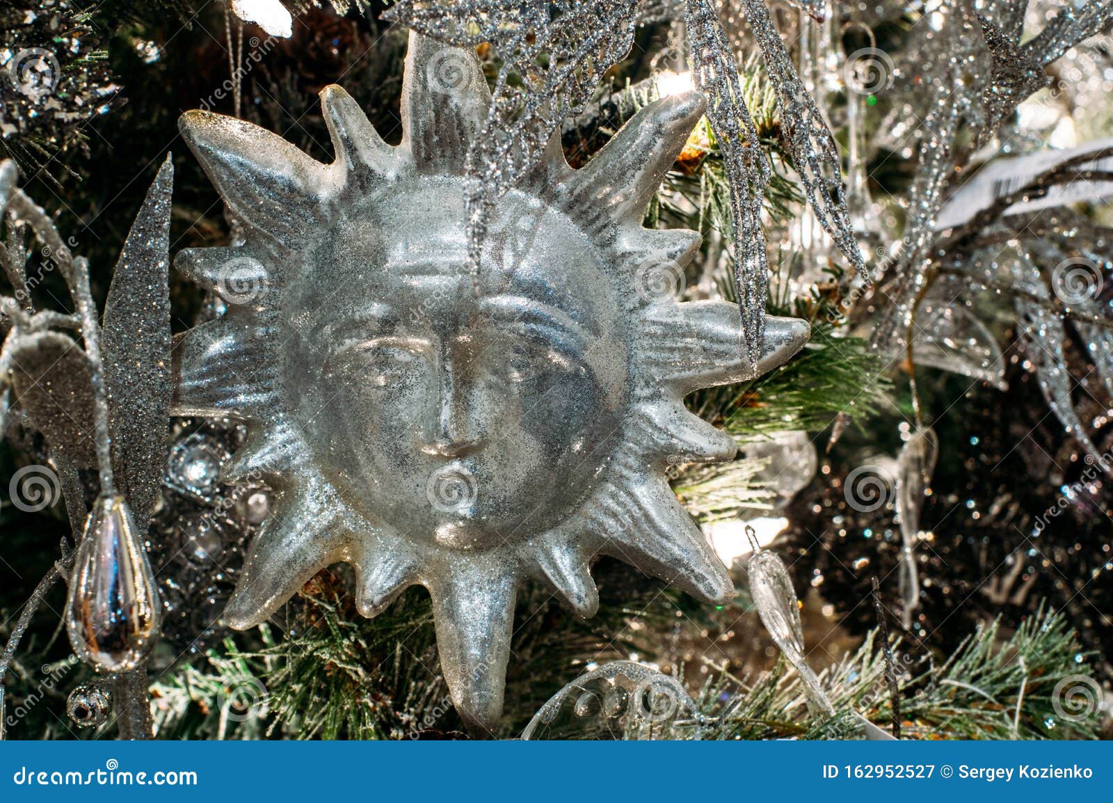 Sun on the christmas tree stock image. Image of cone 162952527