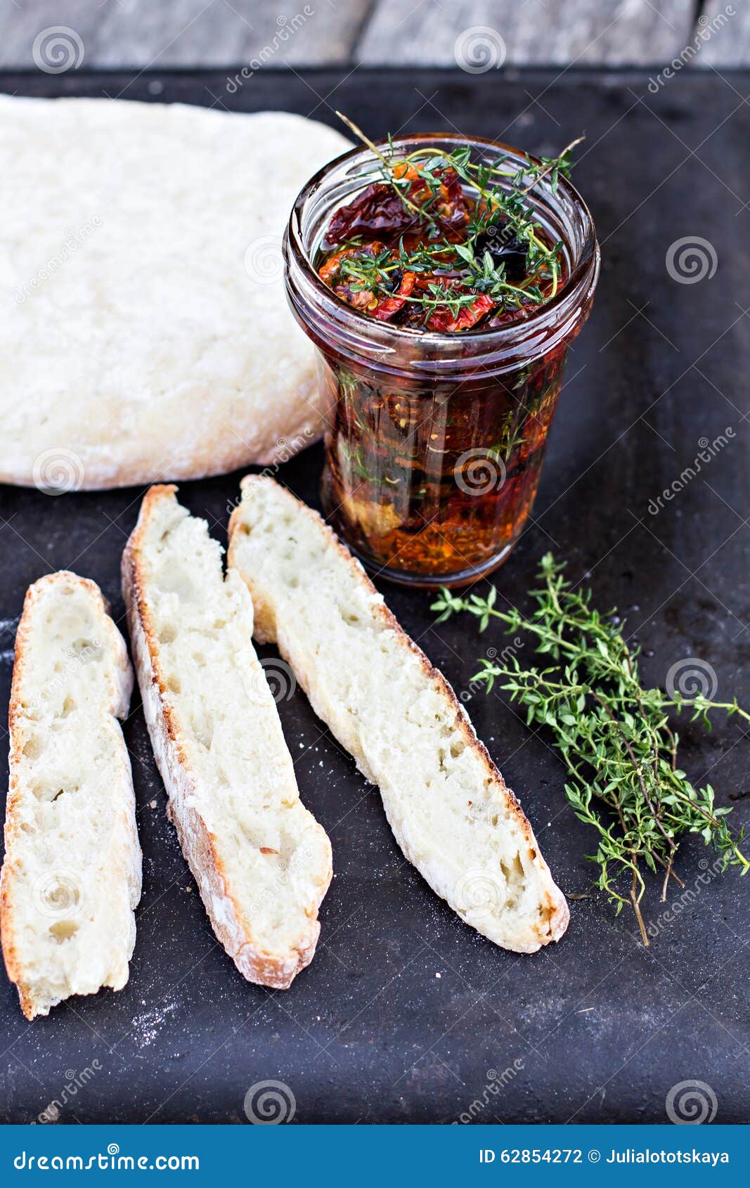 Sun Dried Tomatoes with Herbs Stock Photo Image of preserves, herbs