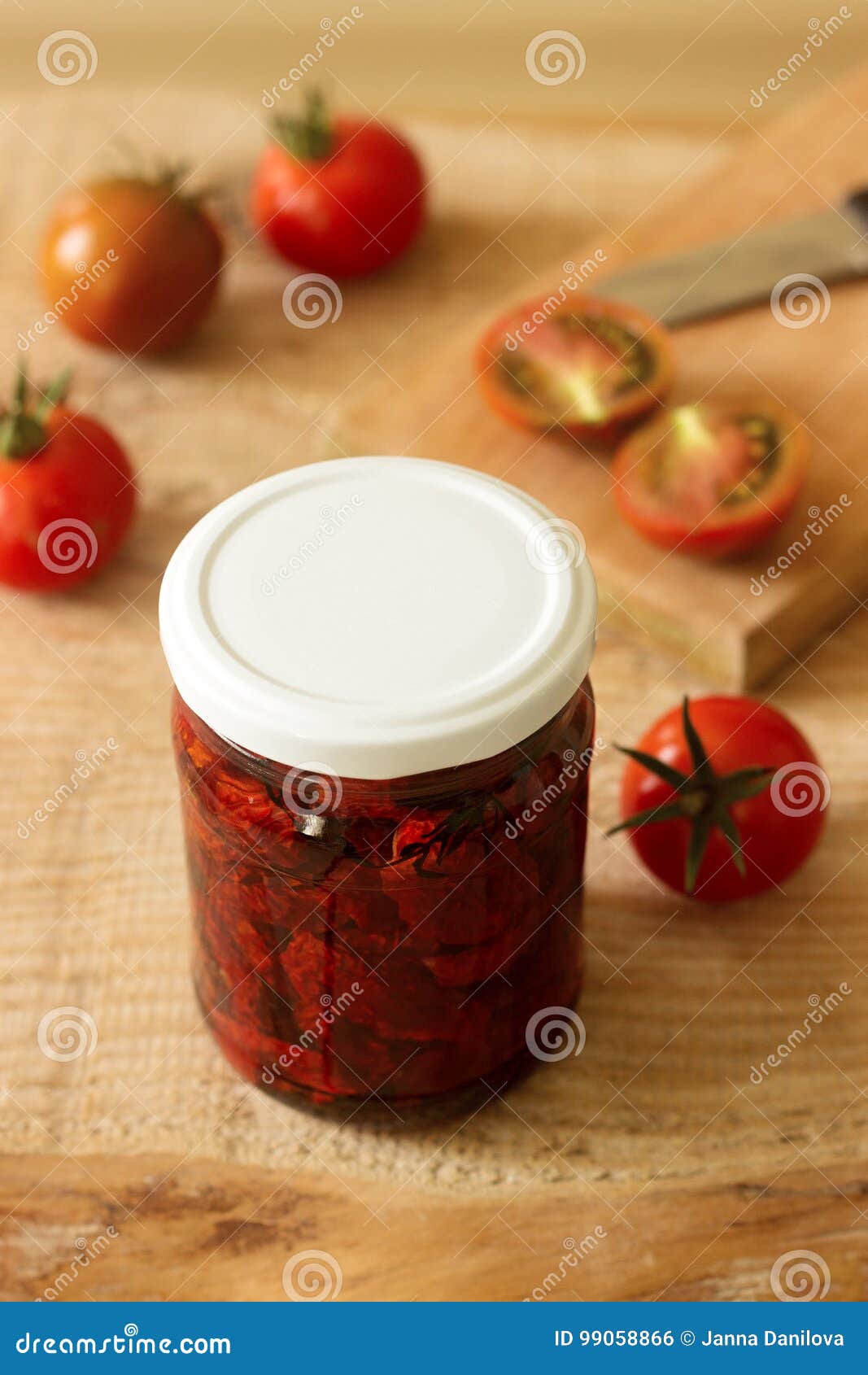 Sun Dried Tomatoes with Olive Oil in a Jar. Stock Photo Image of