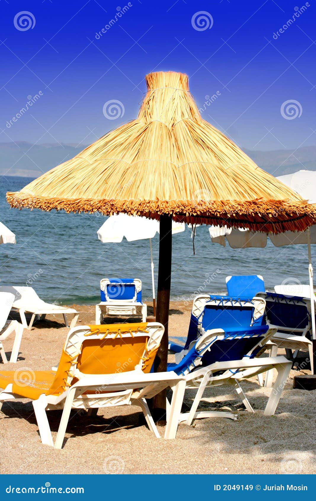 Sun Loungers by the Beach on a Mediterranean Coast Stock Image - Image ...