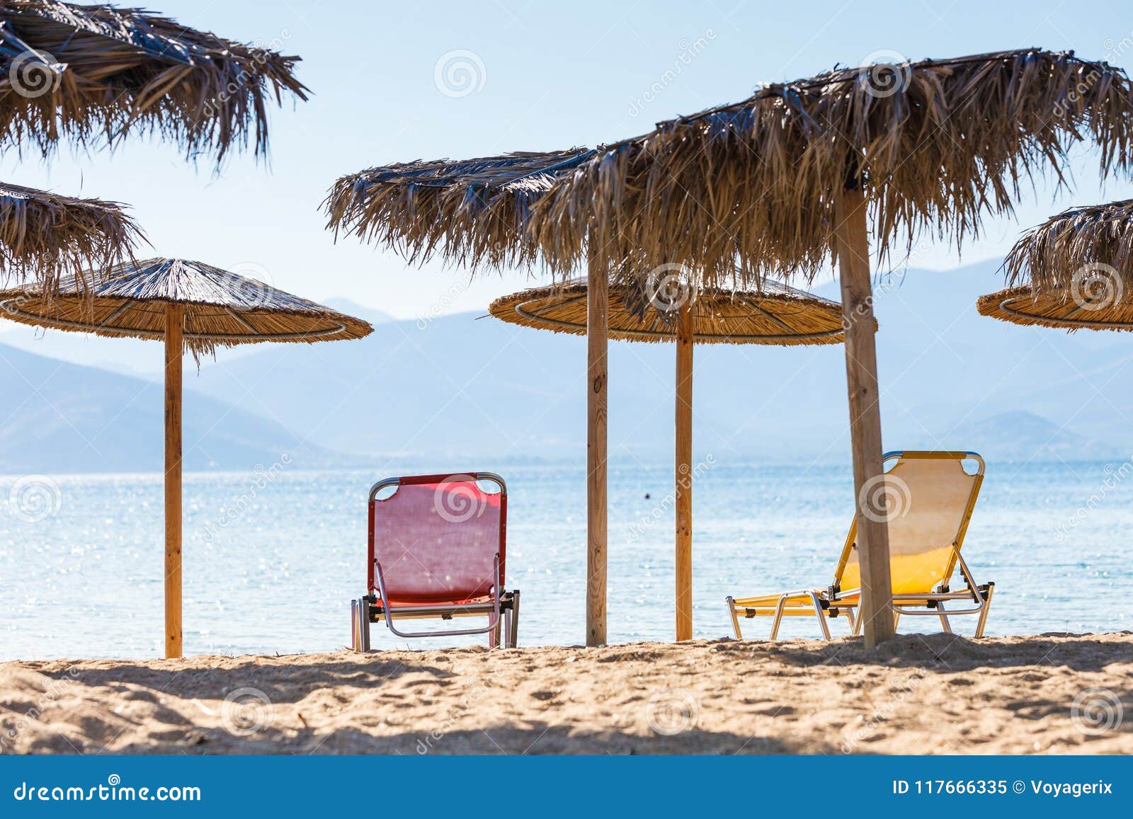 Sun Parasols and Deck Chairs on Beach Stock Image - Image of protection ...