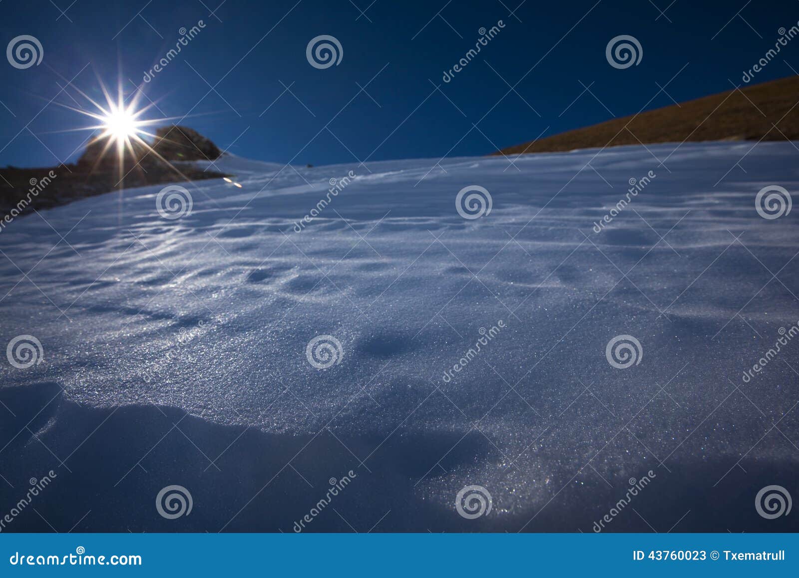 sun on peak of mountain