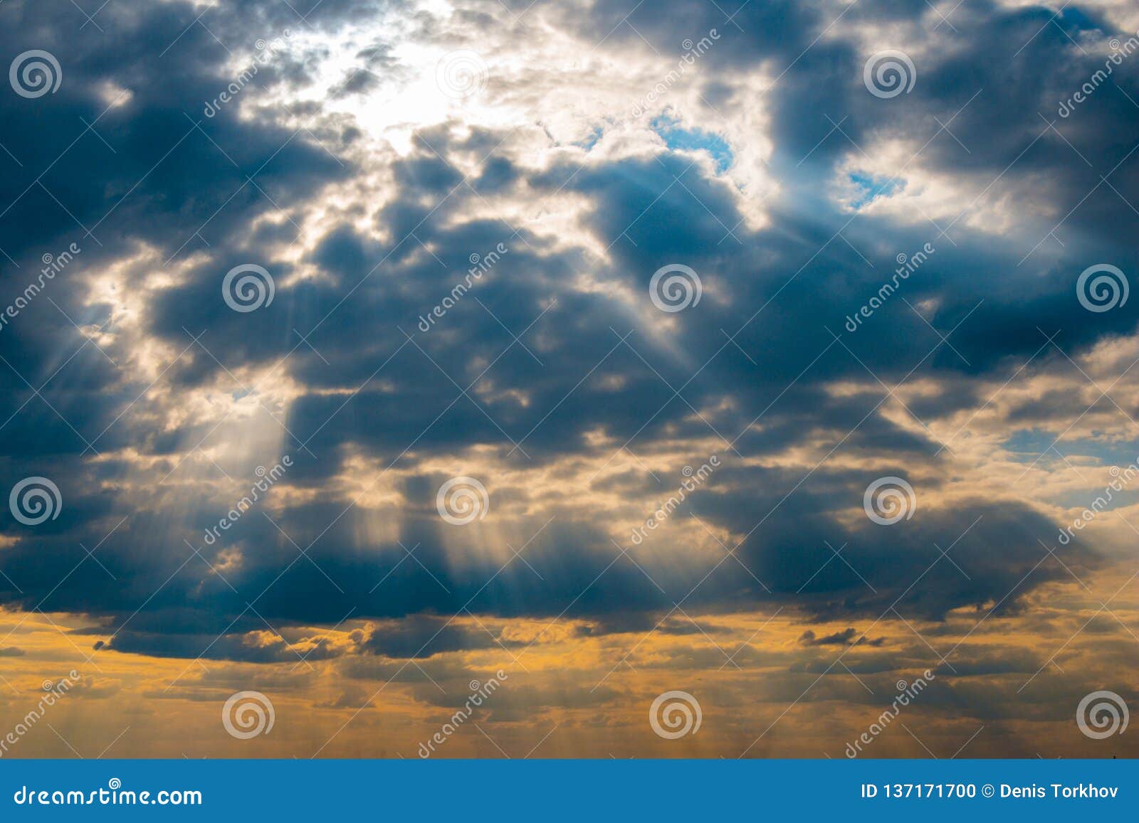 The Sun`s Rays Breaking through the Clouds, Storm Clouds at Sea Stock
