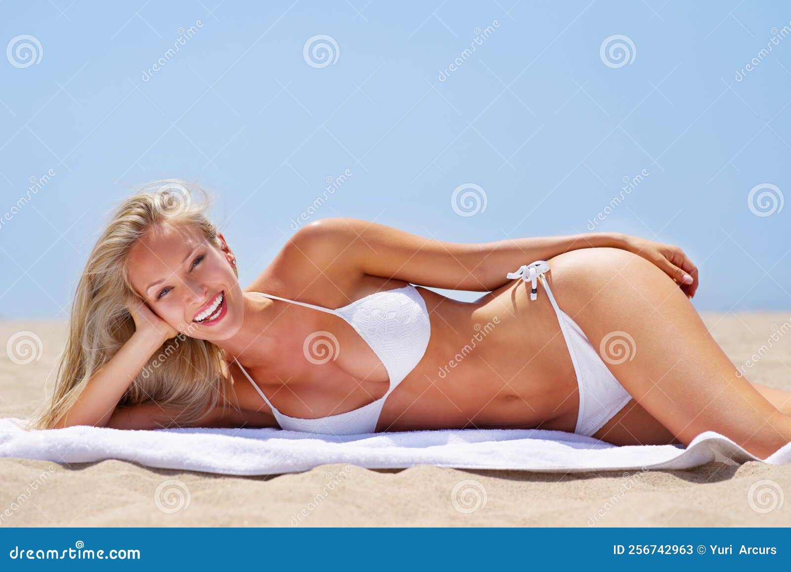 Sun, Sand and Plenty of Sexy. a Sun Kissed Woman Relaxing on the Beach in a  Bikini. Stock Image - Image of blondie, beach: 256742963