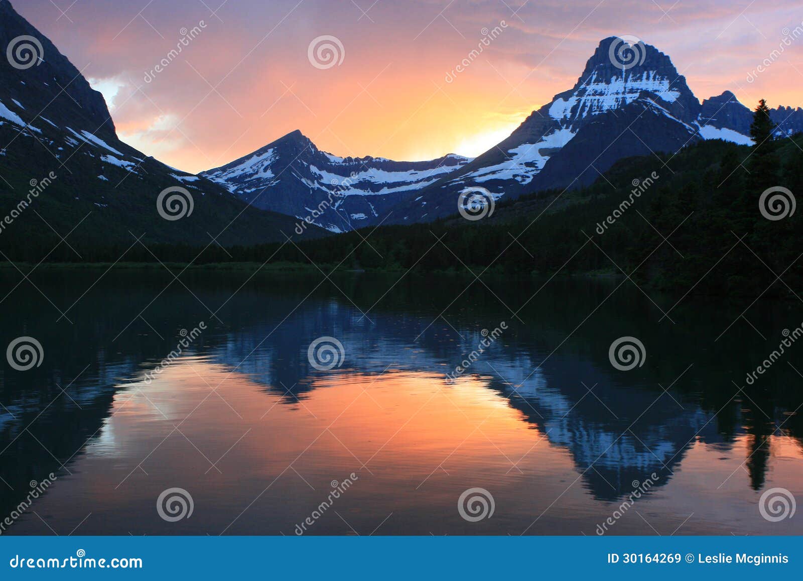 swift current lake at sunset glacier national park