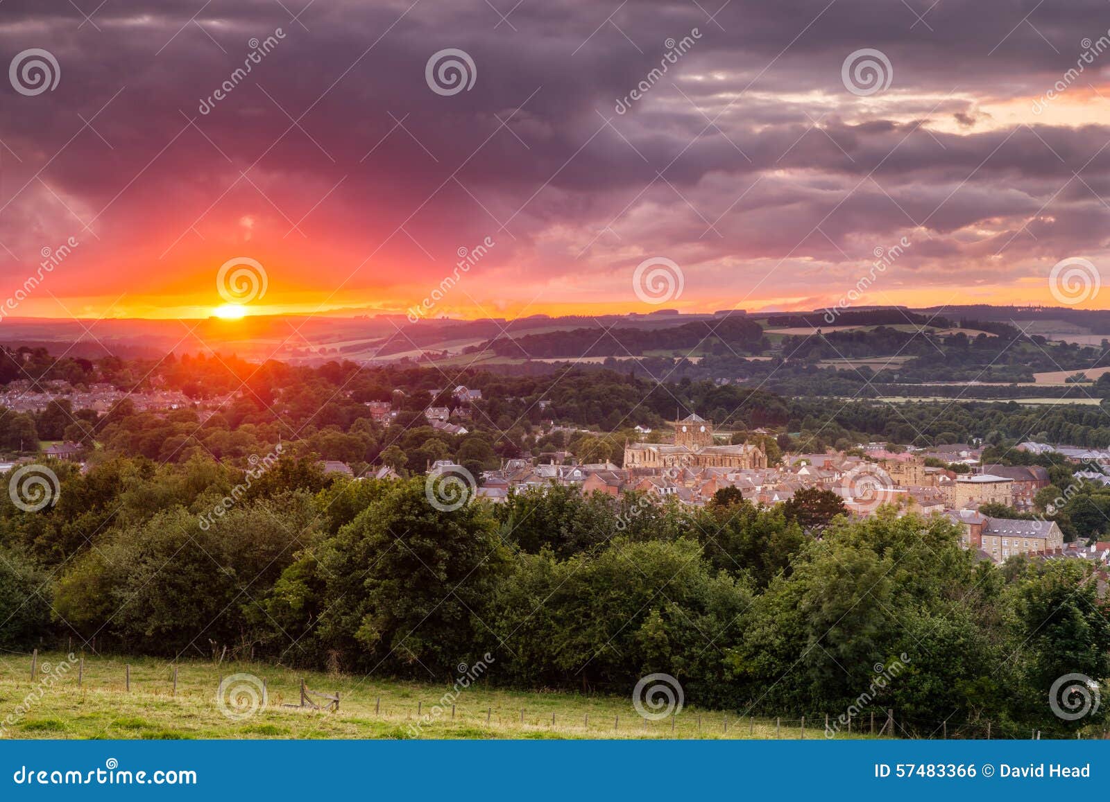 the sun sets over hexham