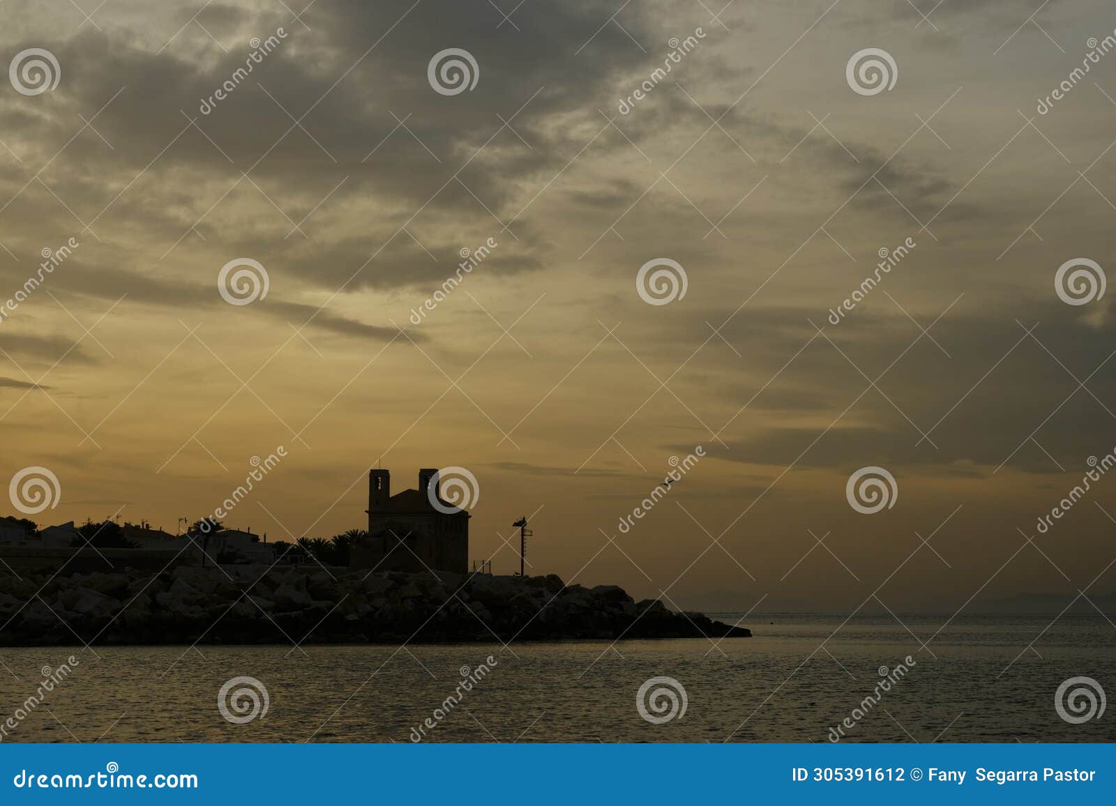 the sunset on the island of tabarca, on a winter sunset