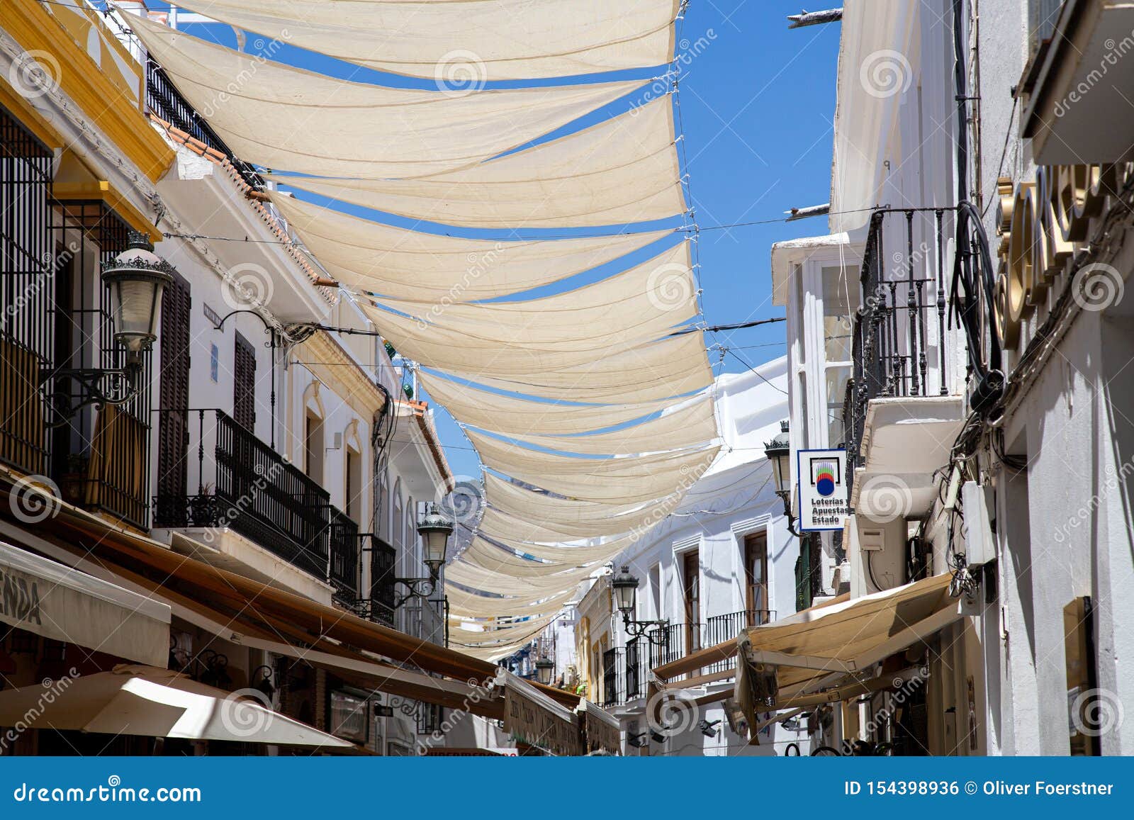 Sun Shade Sails in the Charming Streets of Nerja, Spain Editorial Photo