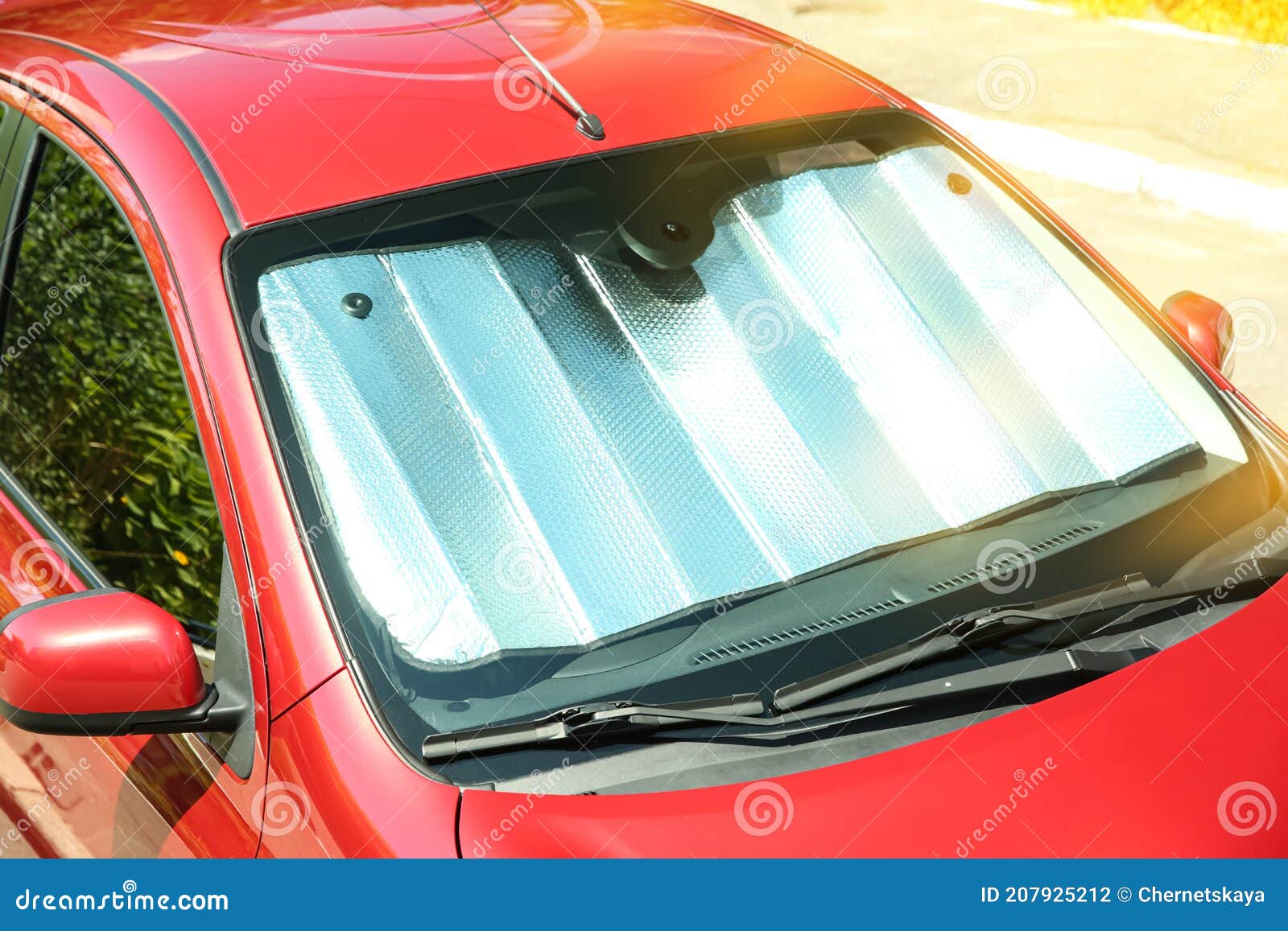 Sun Shade Under Windshield in Car, Closeup. Heat Protection Stock Photo