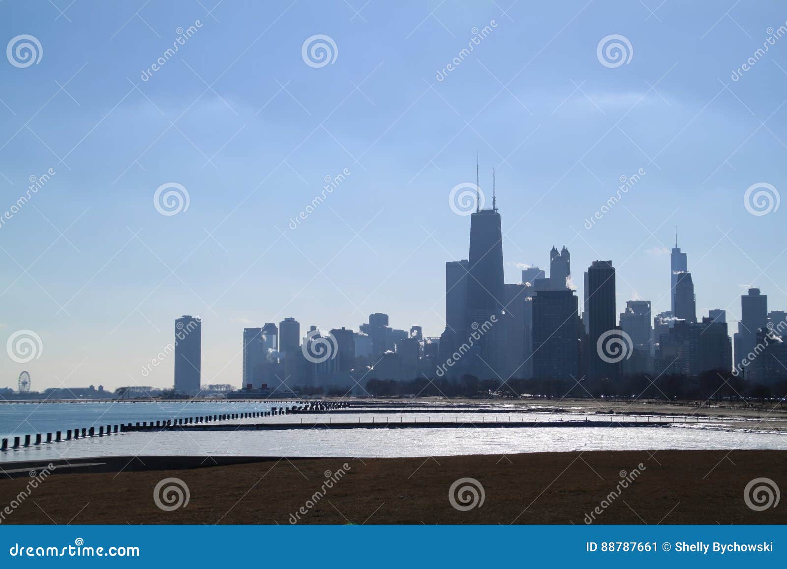 Sunny Day Over Chicago Skyline And A Frozen Lake Michigan Stock Image