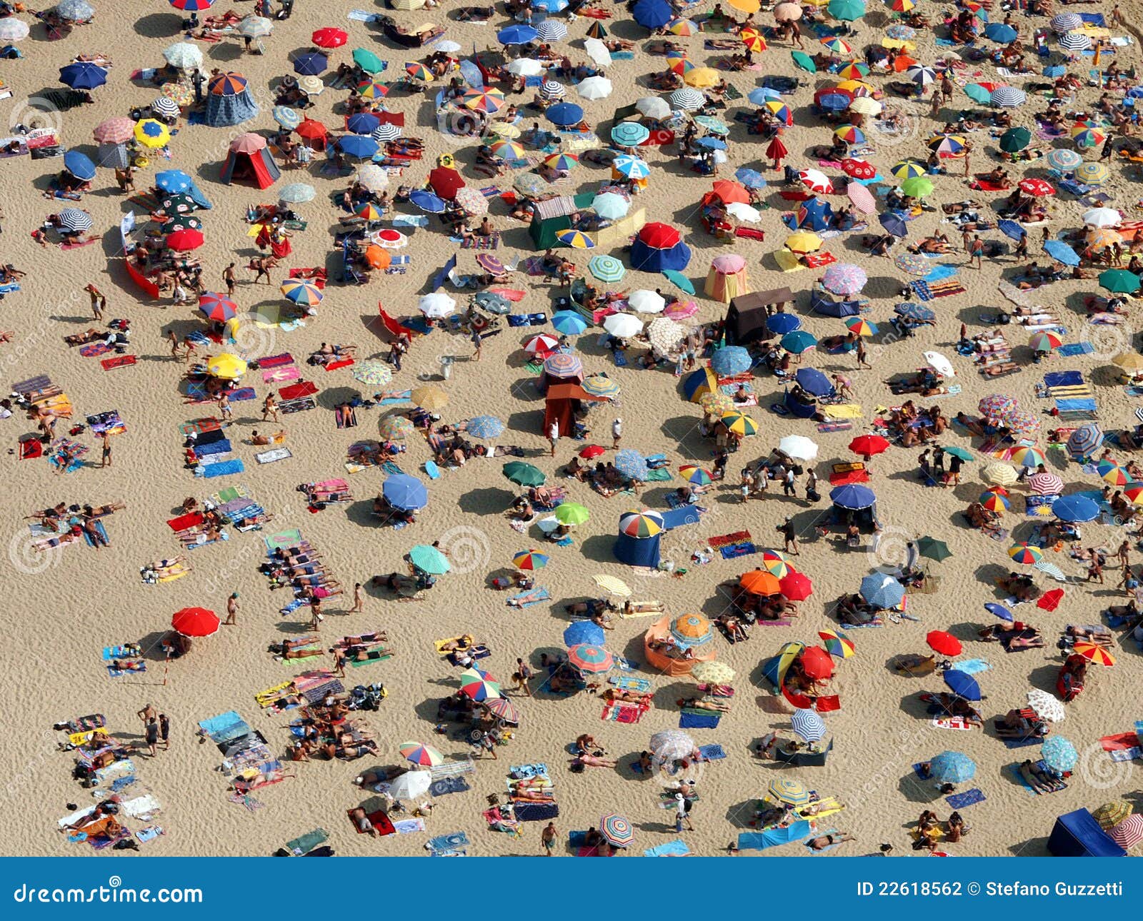 Sun Umbrellas On A Crowded Beach Stock Photo Image 22618562