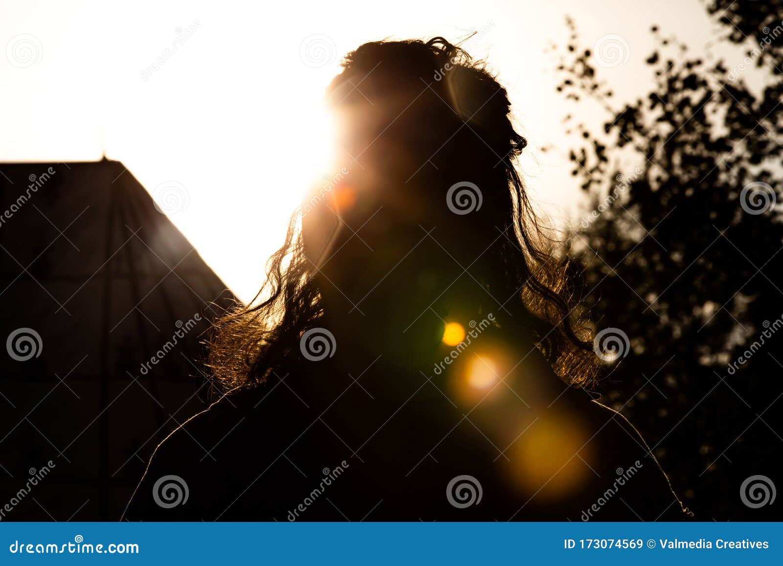 sun worship at campsite with lens flare