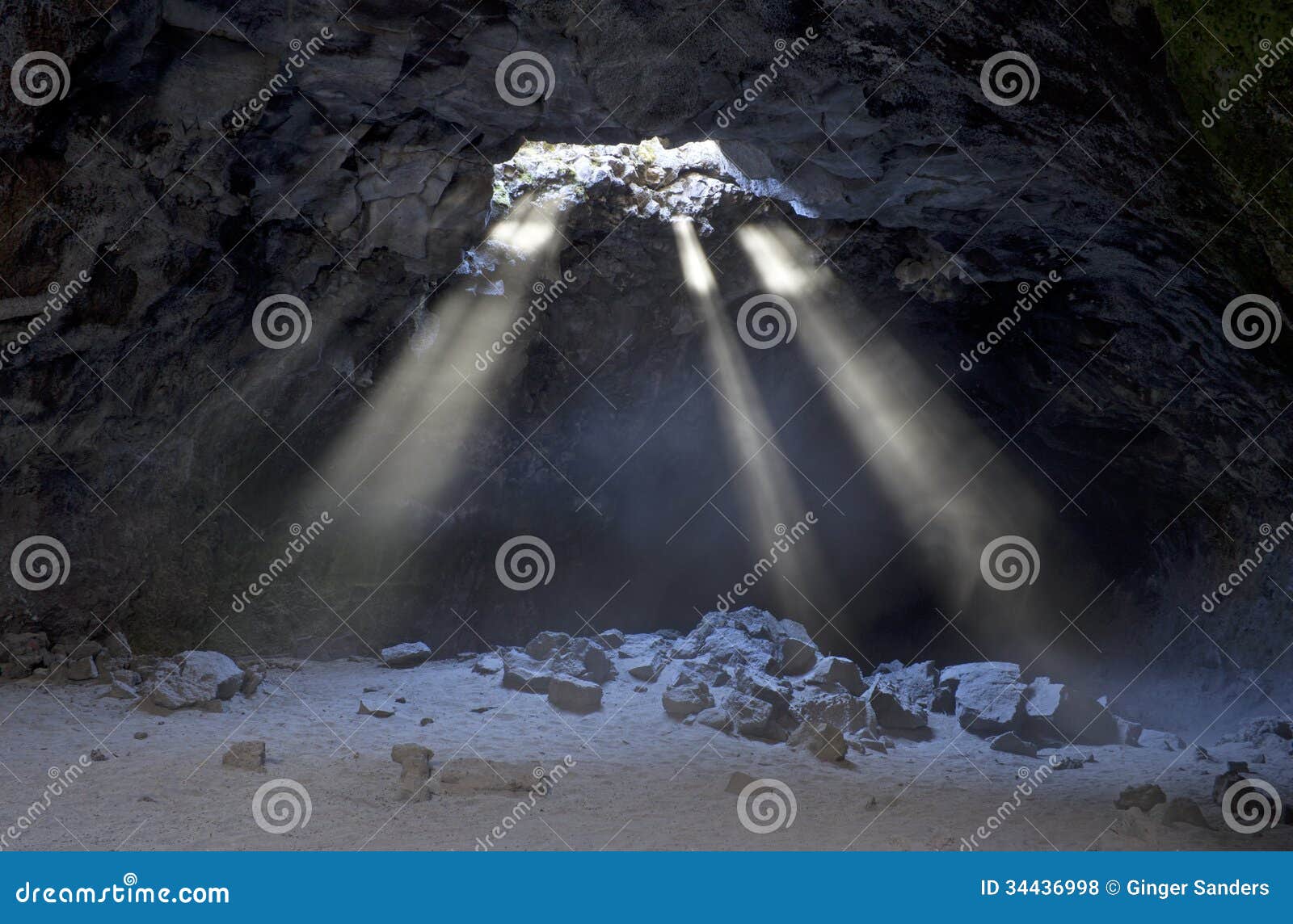 sunbeams from skylight in cave