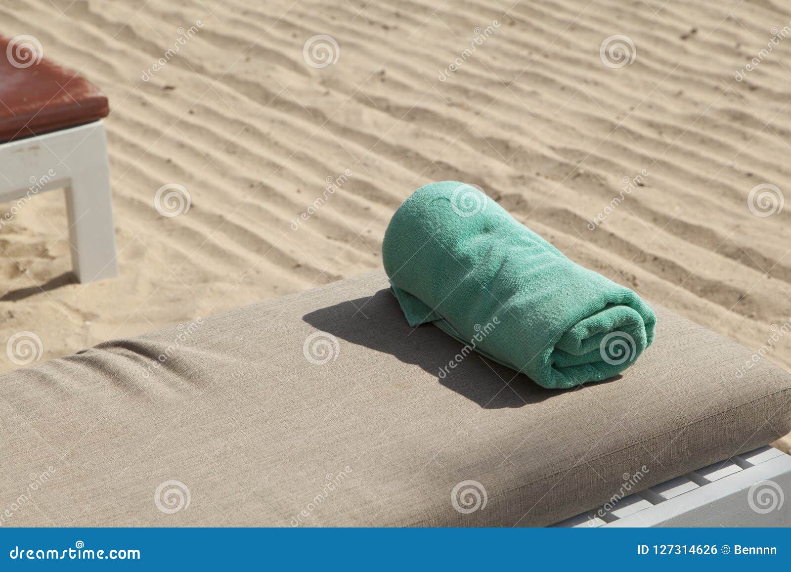 Sunbeds on beach near sea stock photo. Image of paradise 127314626